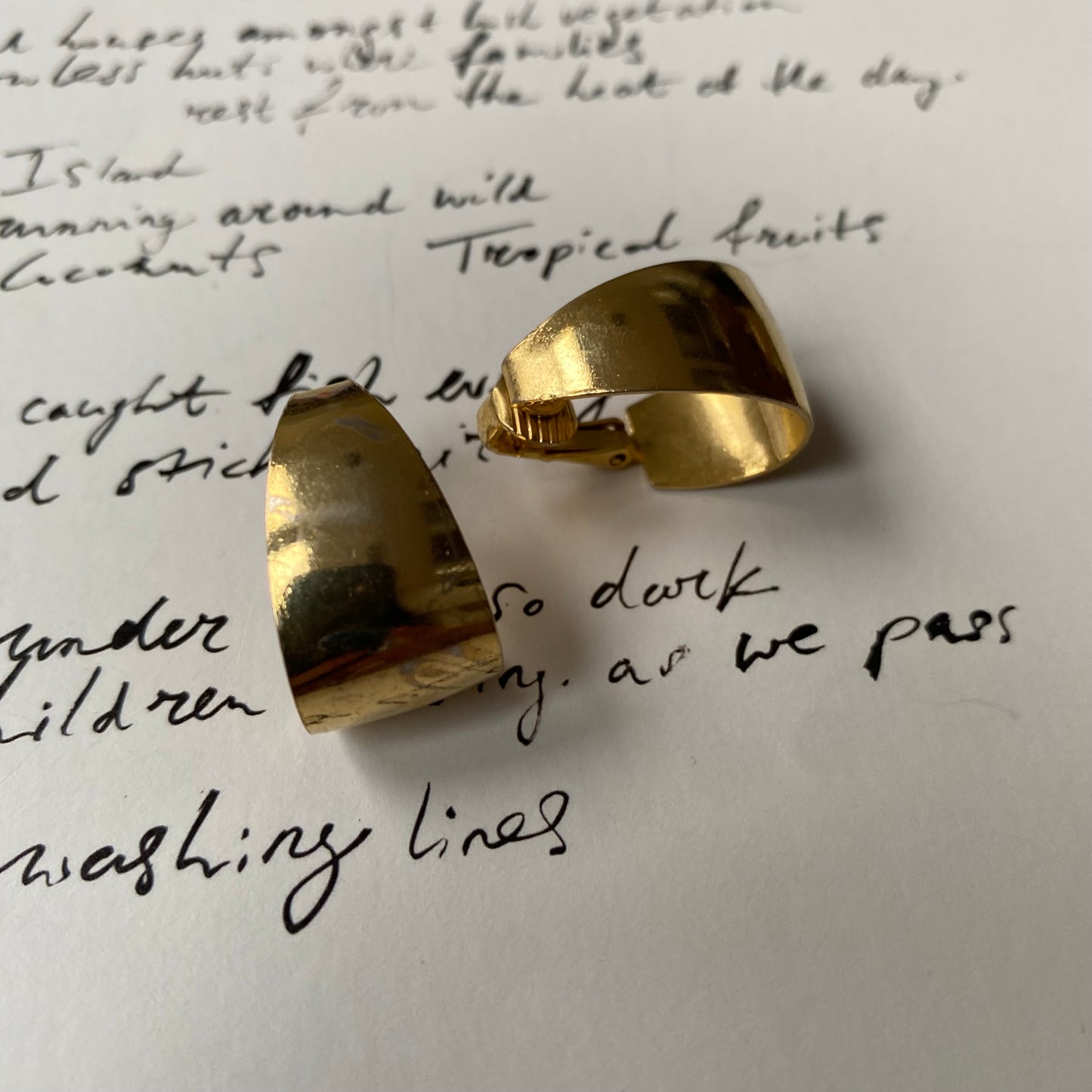 Vintage gold tone small tear shape clip on earrings