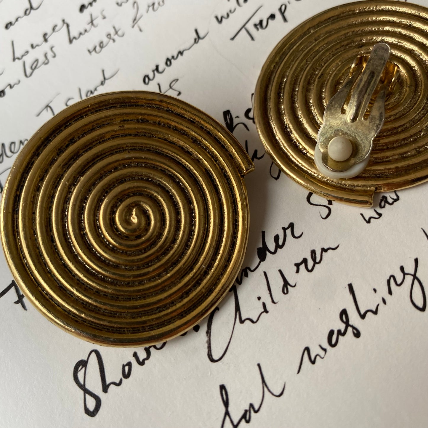 Vintage gold tone round swirl clip on earrings