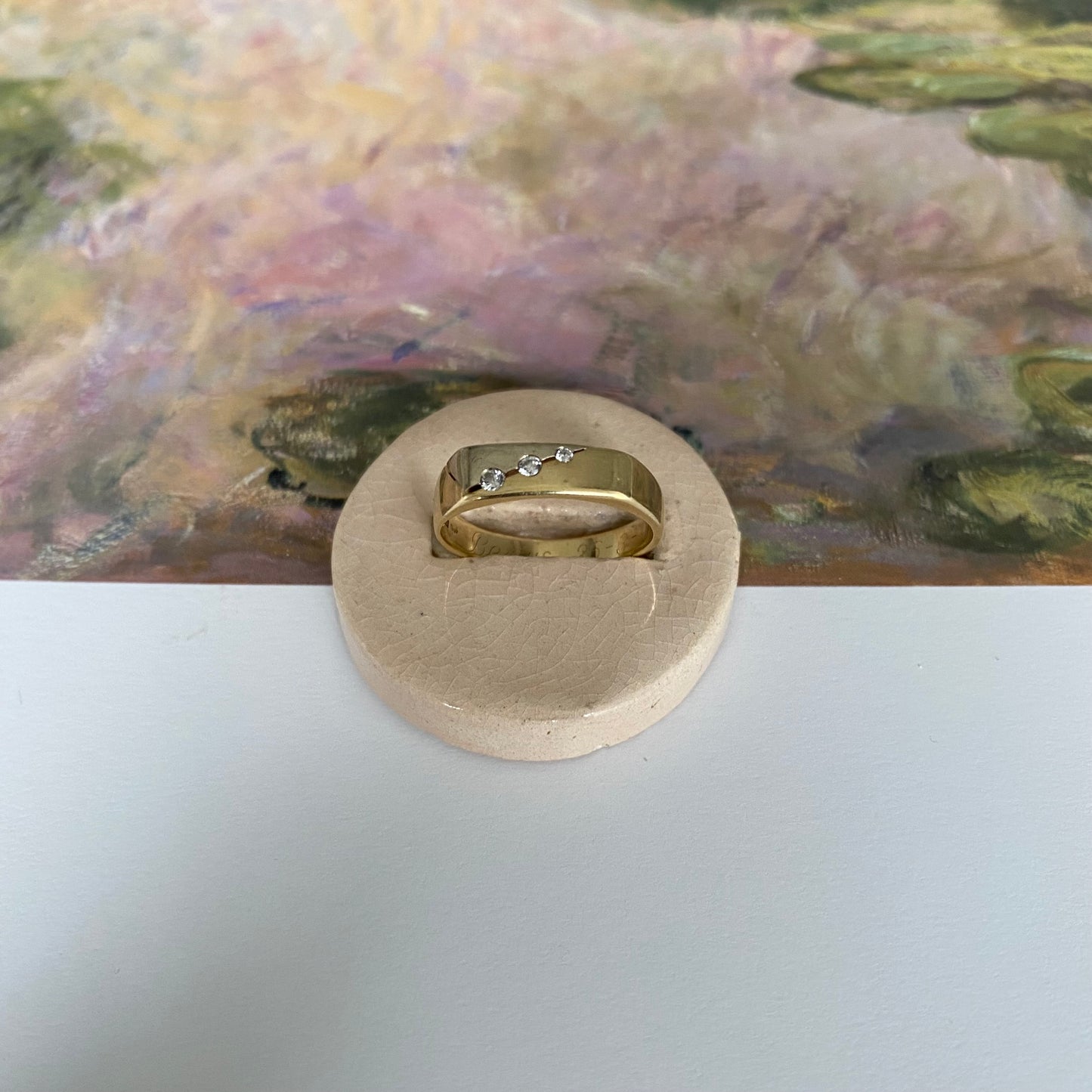 14 carat yellow and white gold signet band ring with triple diamond