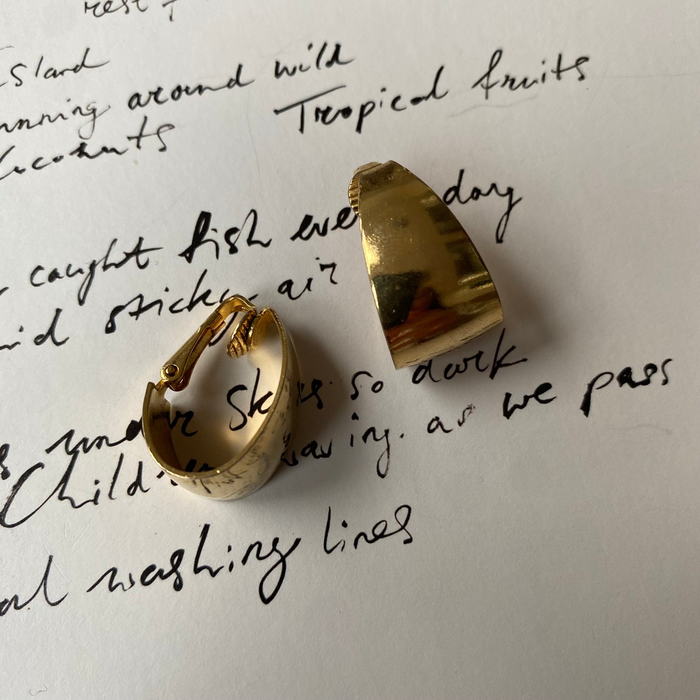 Vintage gold tone small tear shape clip on earrings