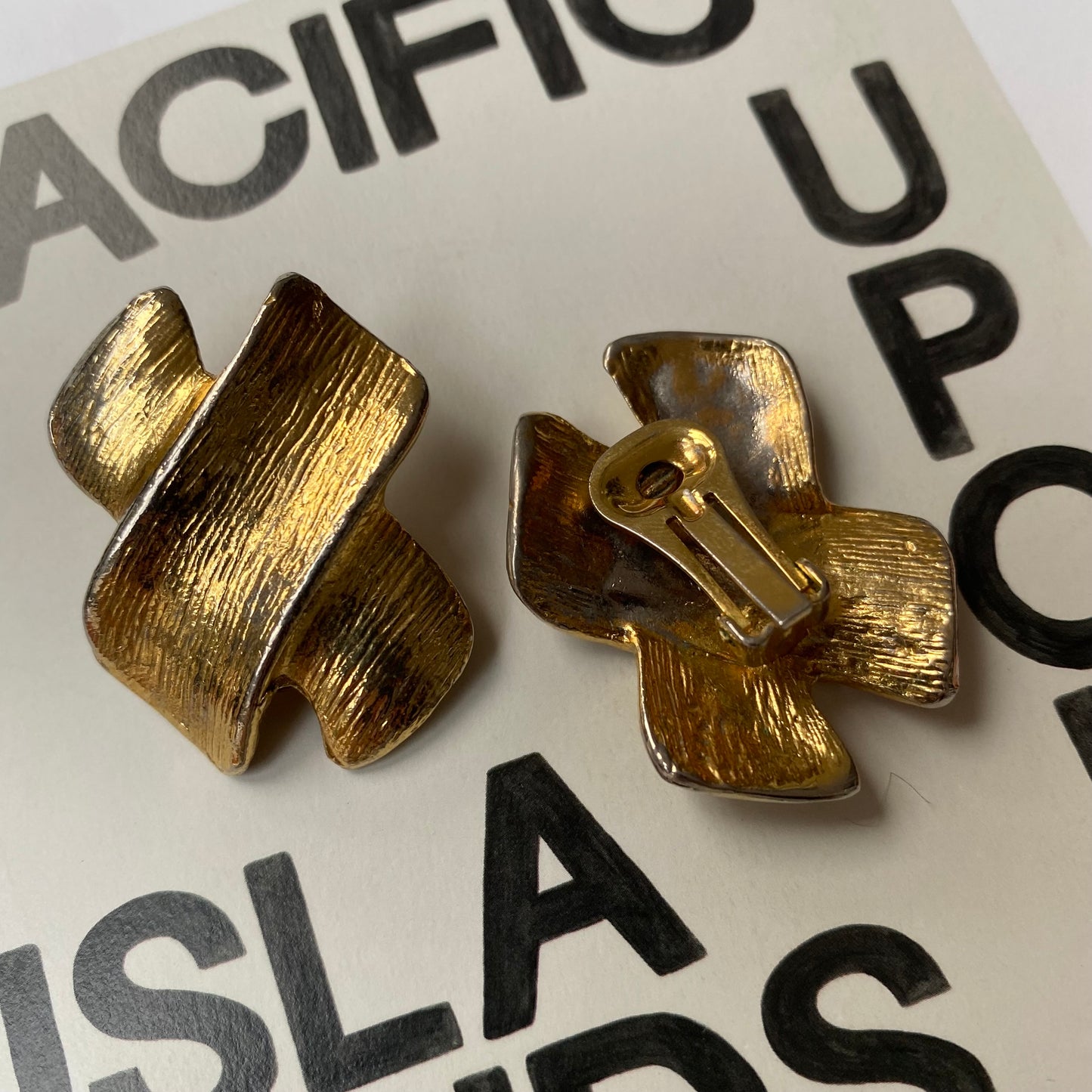 Vintage metal gold tone clean cross clip on earrings