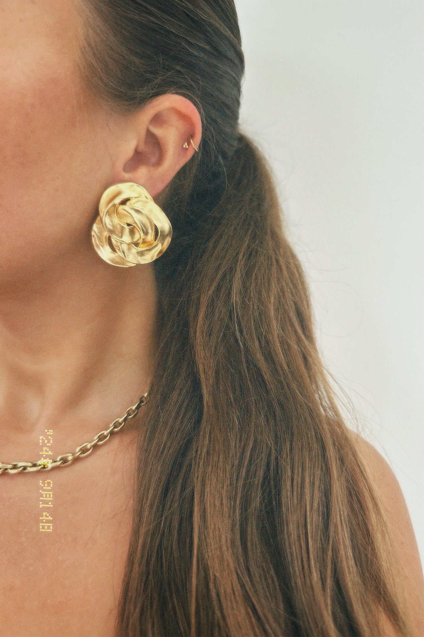 Vintage gold tone big triple twist clip on earrings
