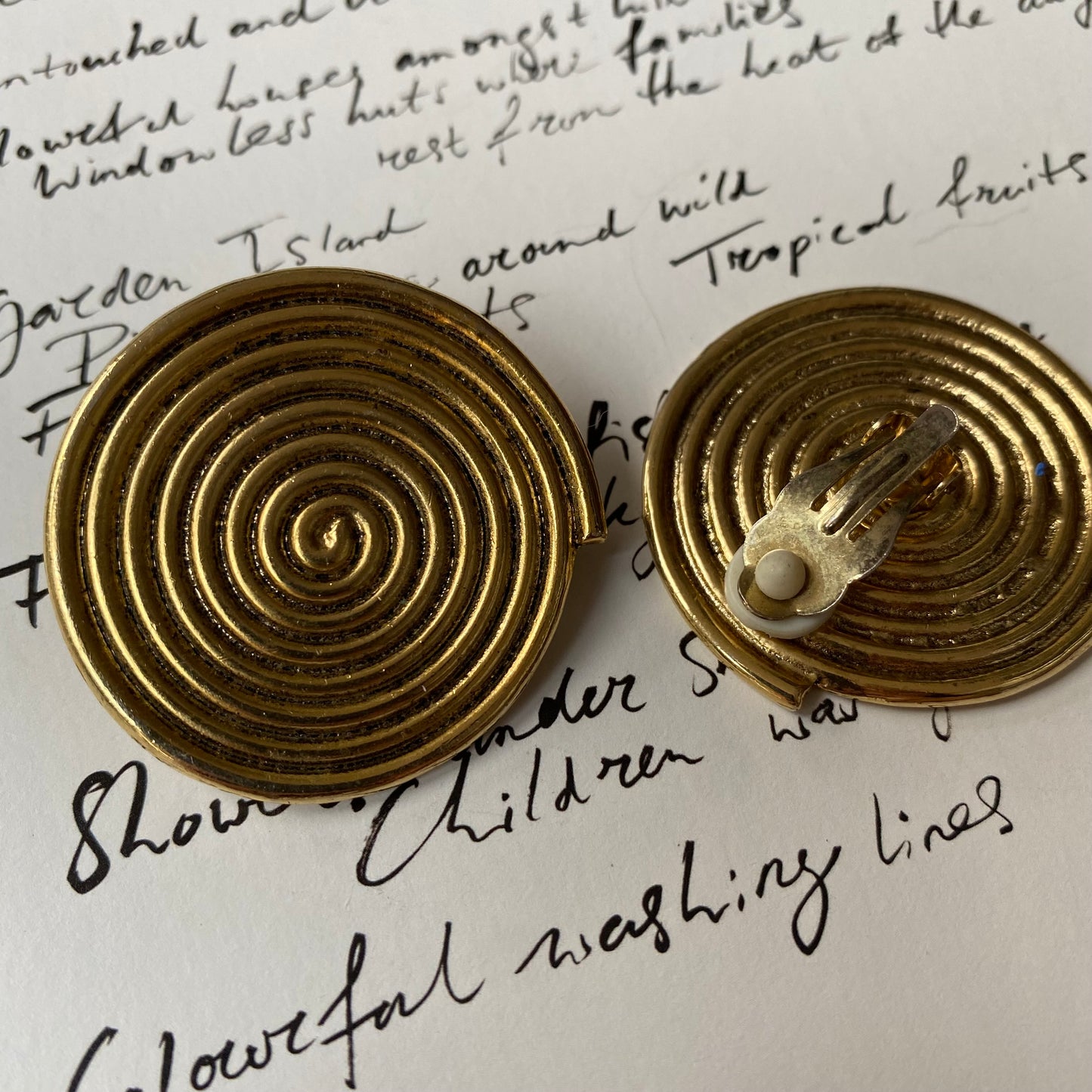 Vintage gold tone round swirl clip on earrings