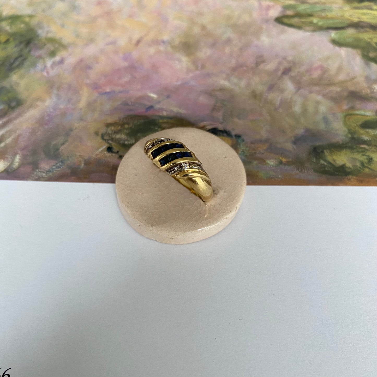 18 carat gold sapphire and diamond croissant ring