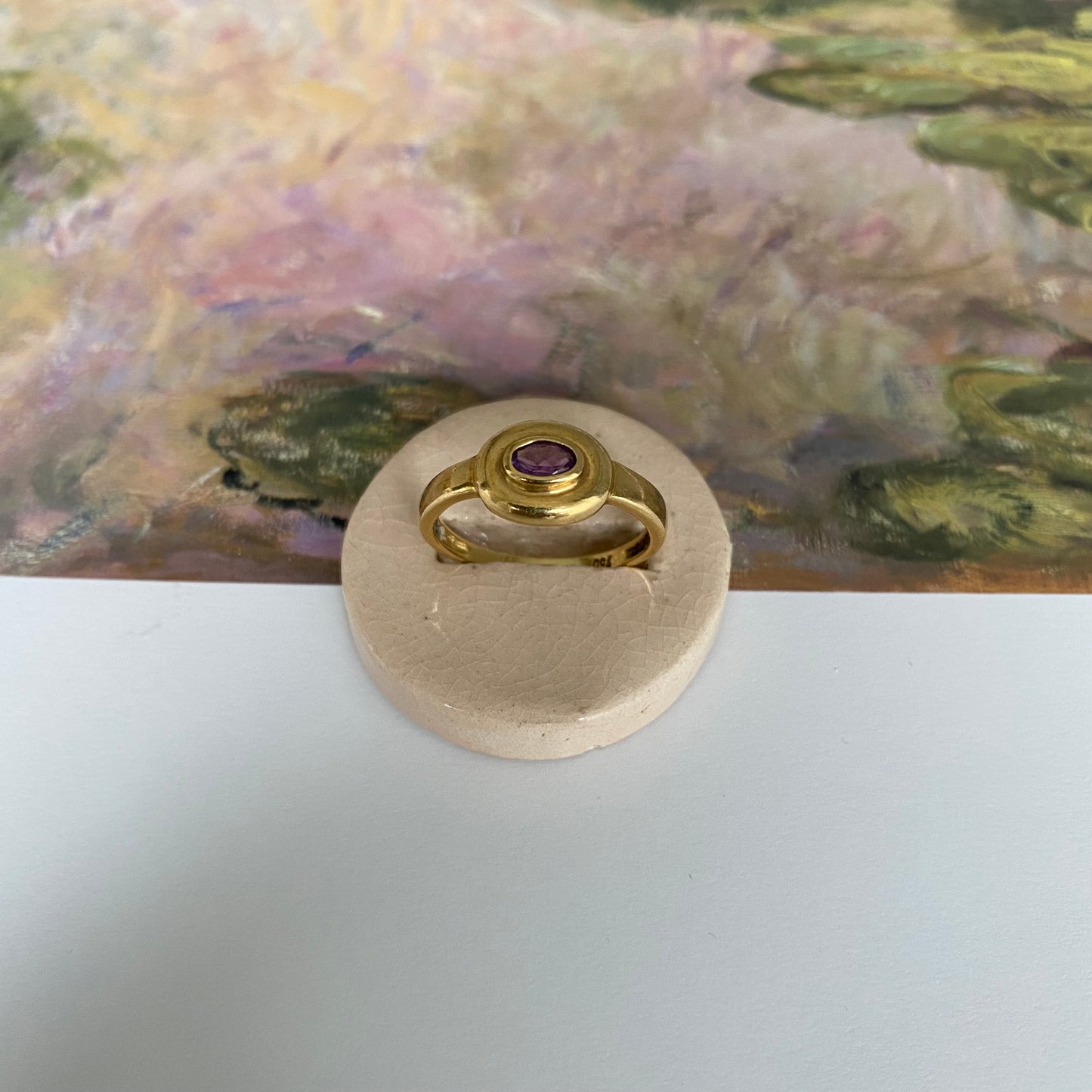 18 carat gold modern oval amethyst ring