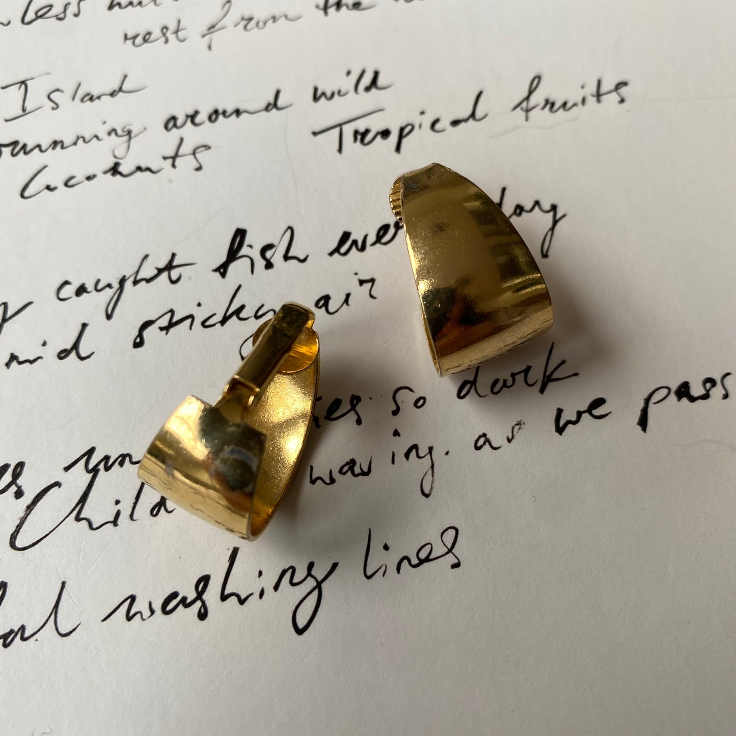 Vintage gold tone small tear shape clip on earrings
