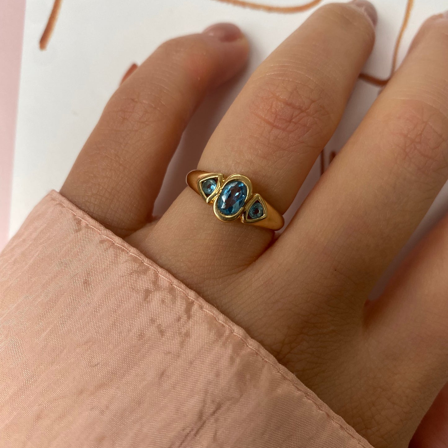 18 carat gold modern trilogy spinel ring