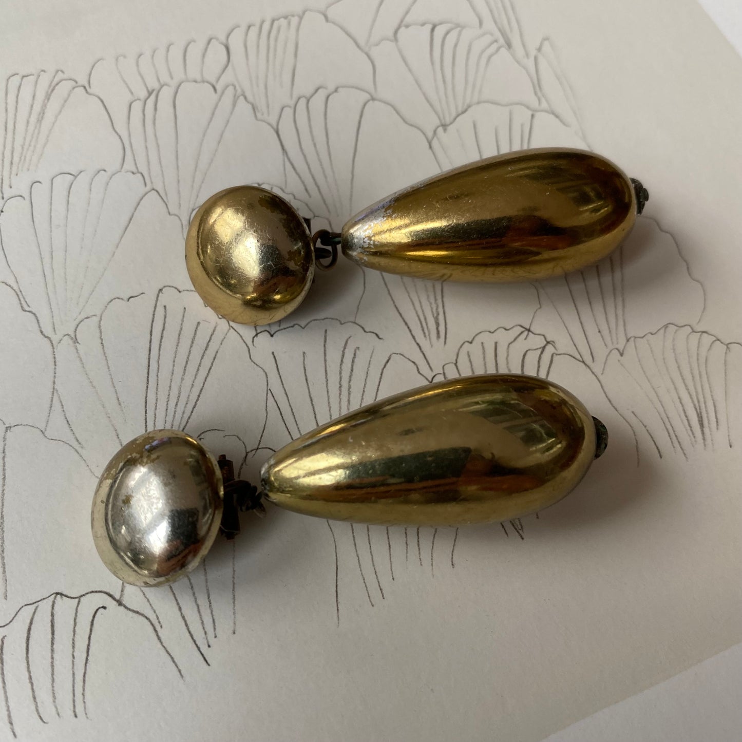 Vintage gold tone dangling tear clip on earrings
