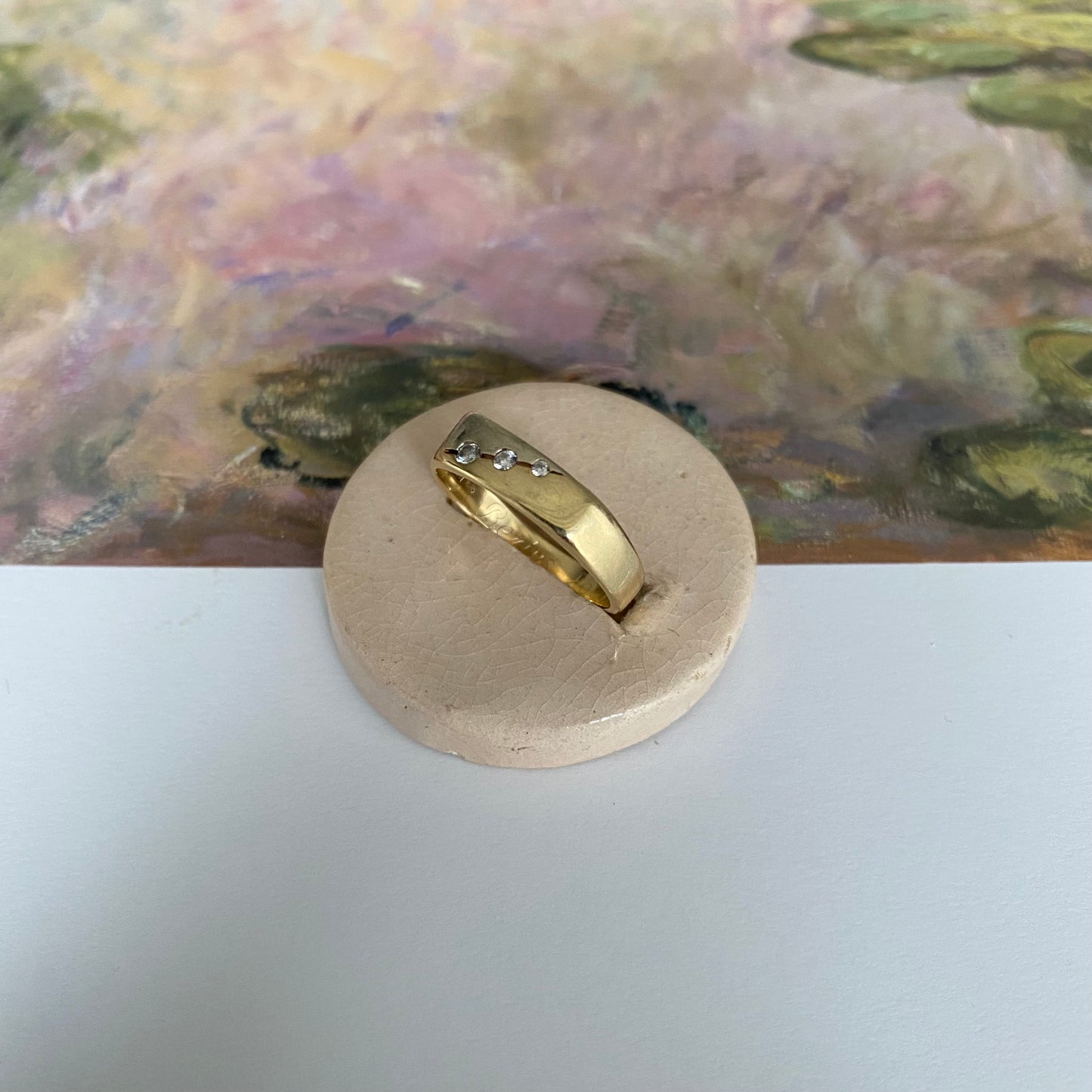 14 carat yellow and white gold signet band ring with triple diamond