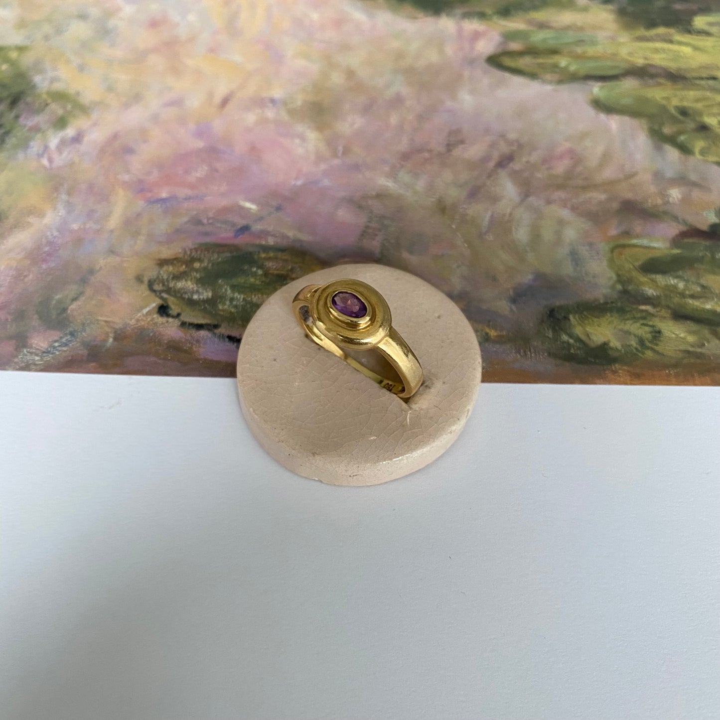 18 carat gold modern oval amethyst ring