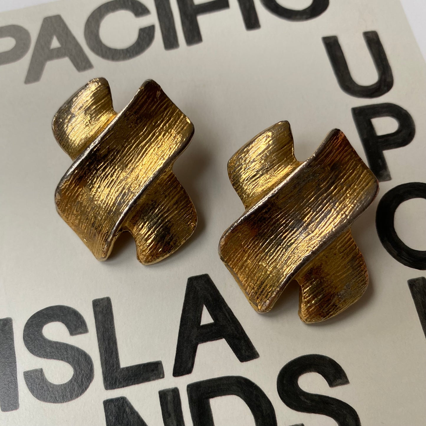 Vintage metal gold tone clean cross clip on earrings