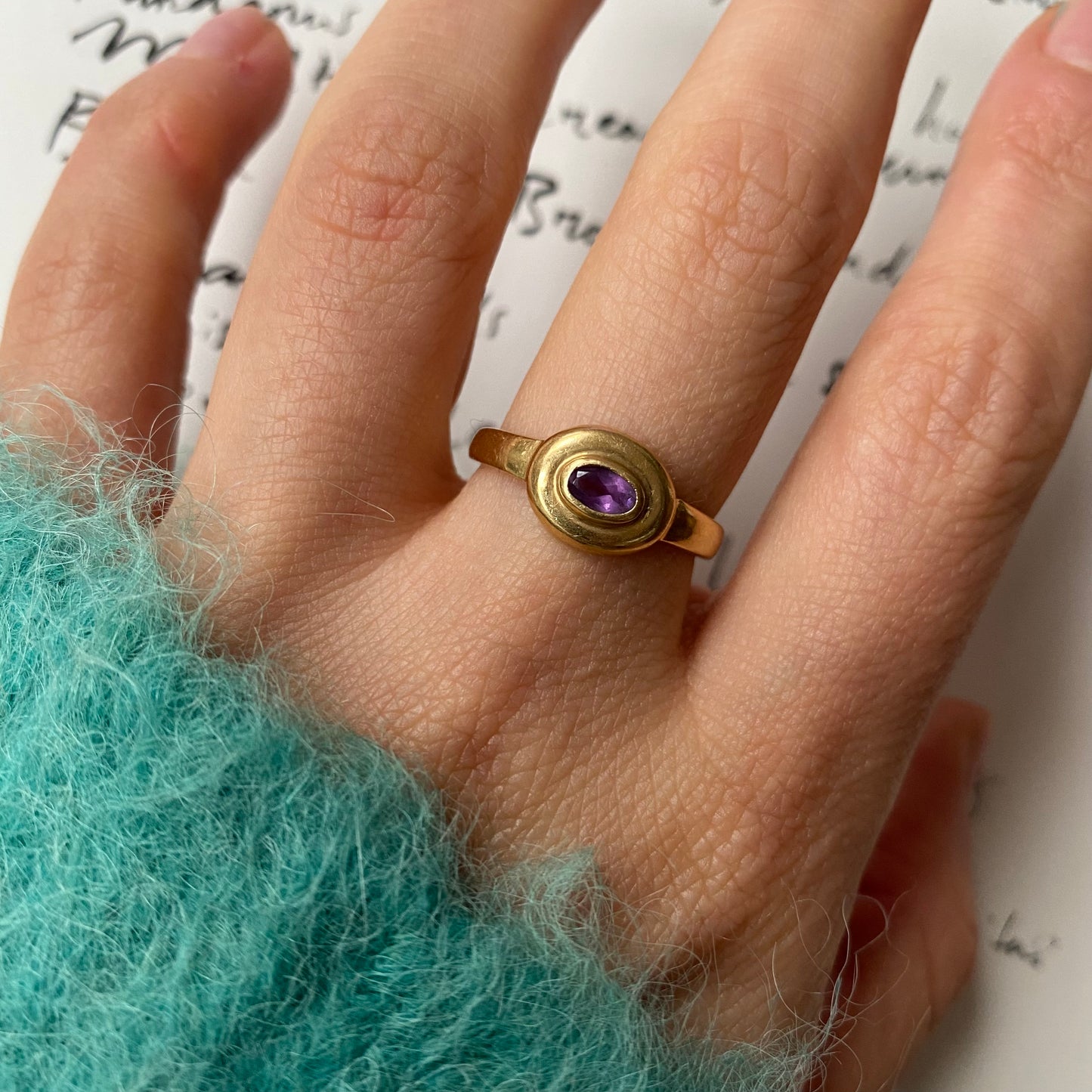 18 carat gold modern oval amethyst ring