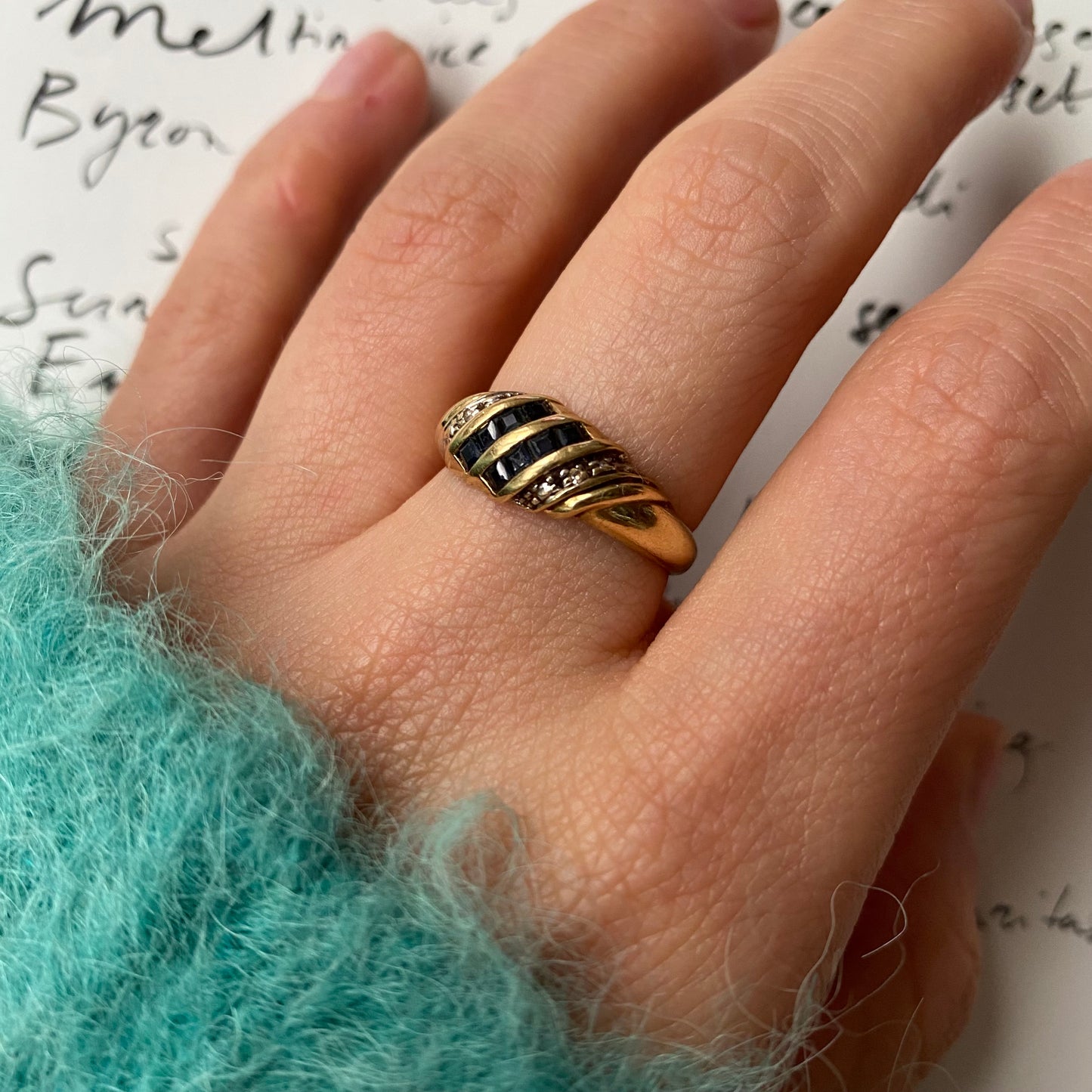 18 carat gold sapphire and diamond croissant ring