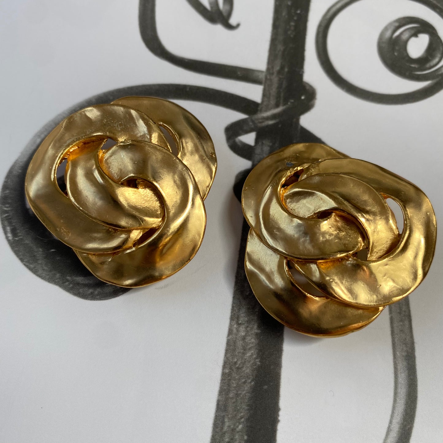 Vintage gold tone big triple twist clip on earrings