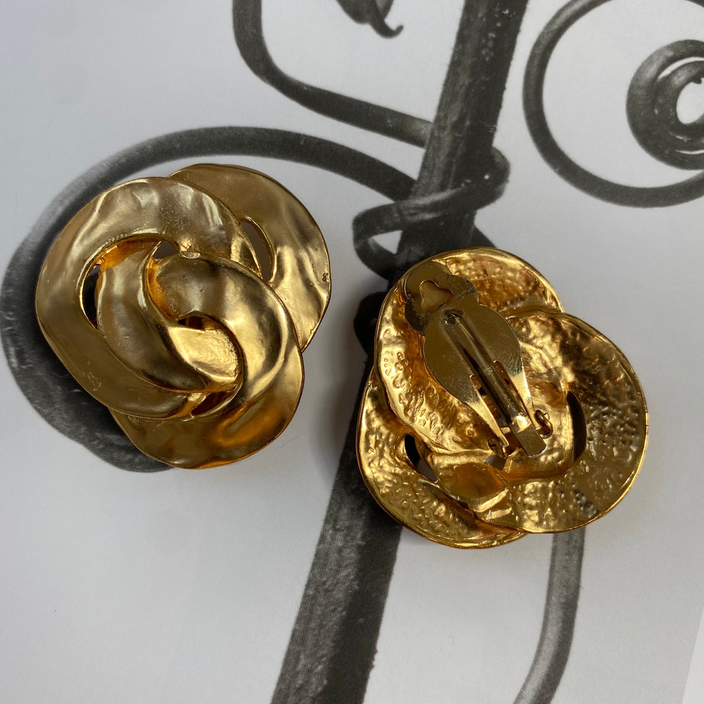 Vintage gold tone big triple twist clip on earrings