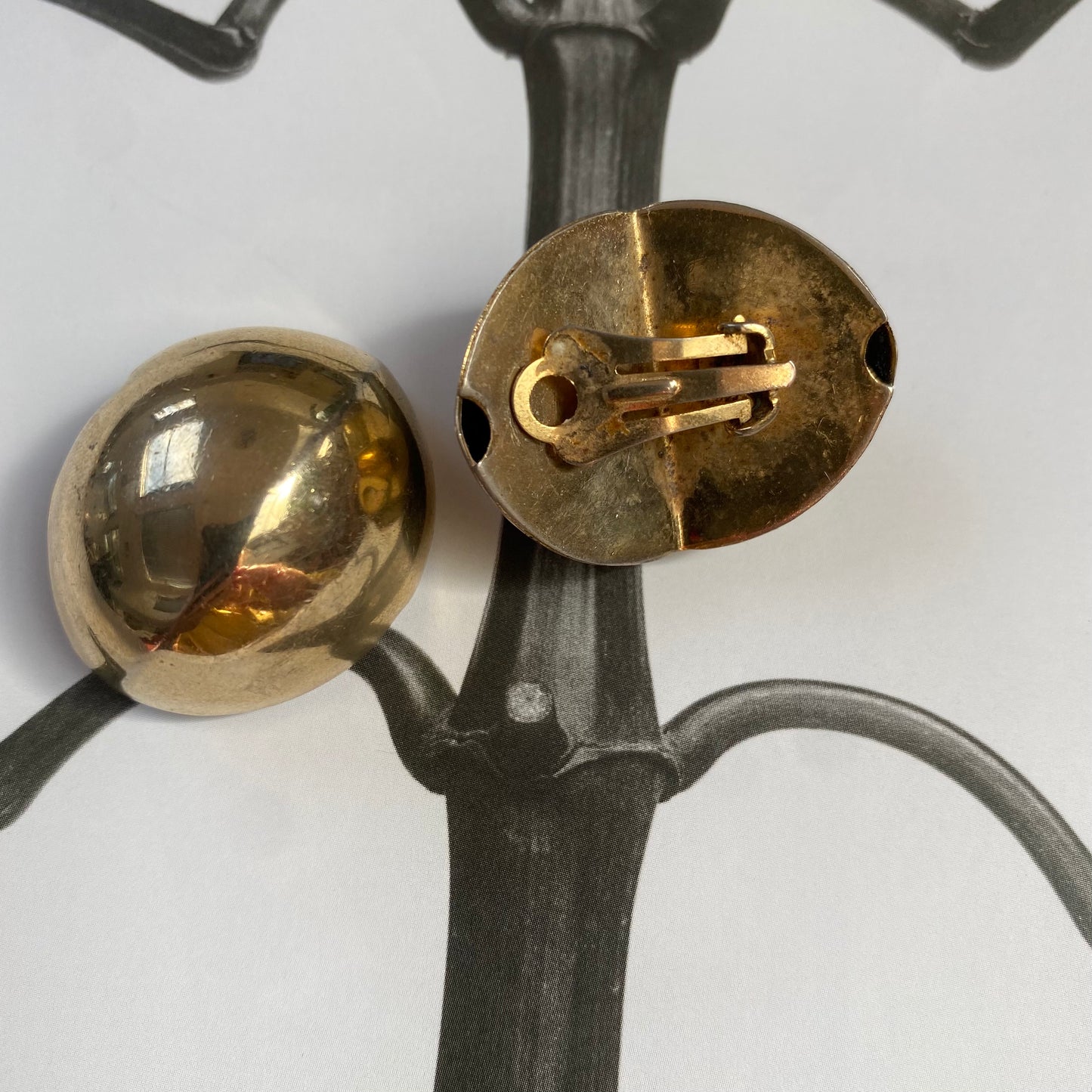 Vintage gold tone new shape dome clip on earrings