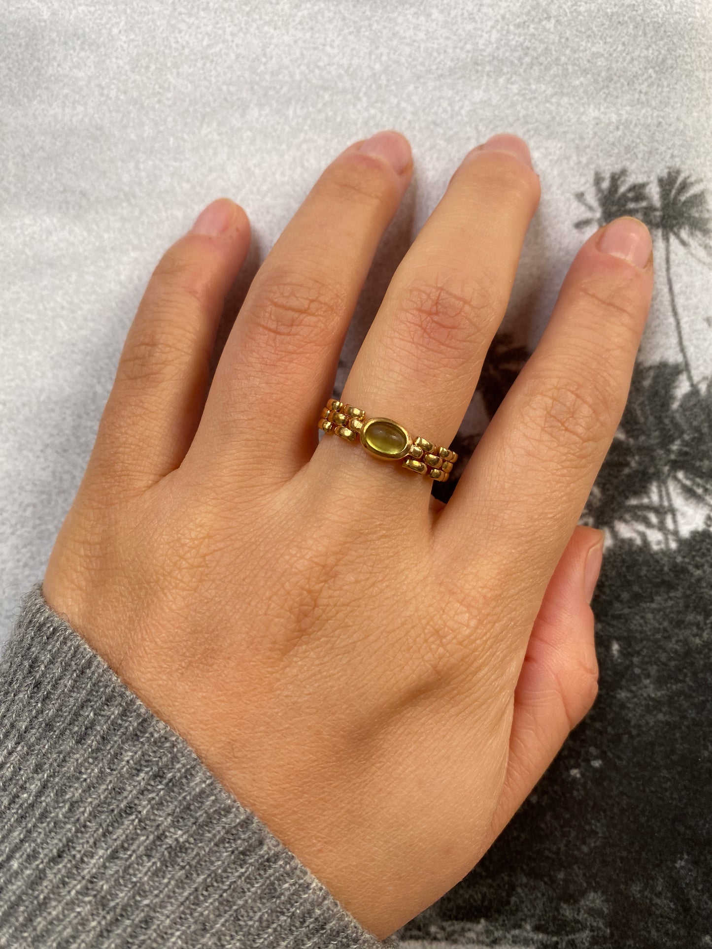 14 carat gold peridot rolex ring