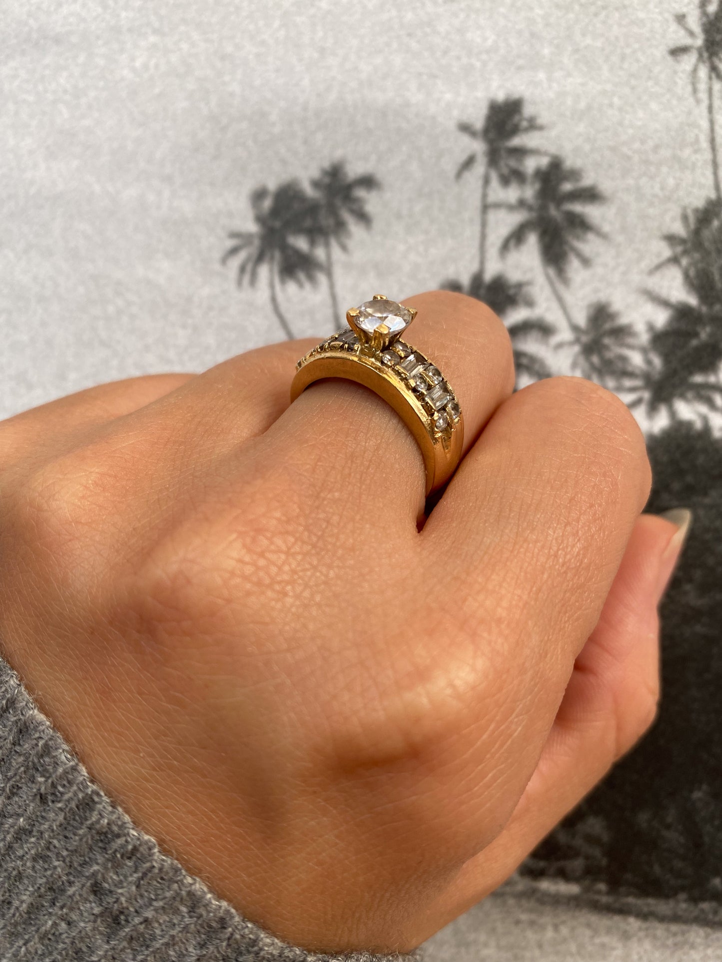 14 carat gold ring with baguette and round cut strass