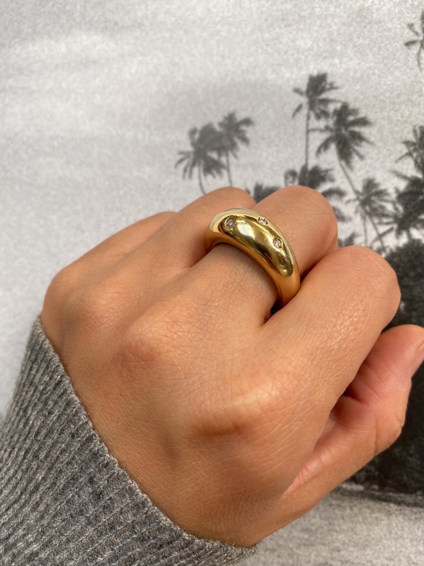 18 carat gold bold dome ring with diamonds