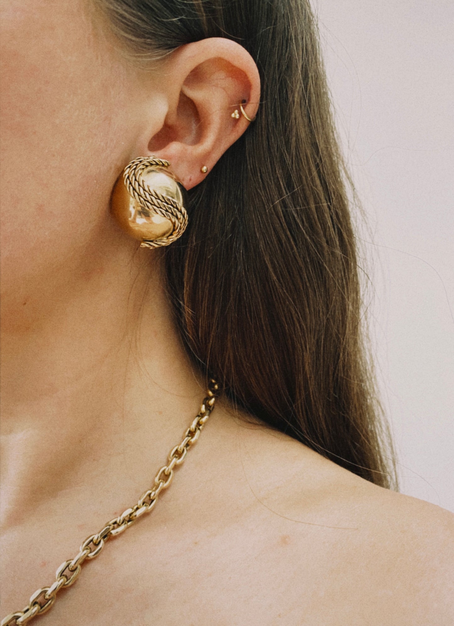 Vintage gold clip on earring with rope detail