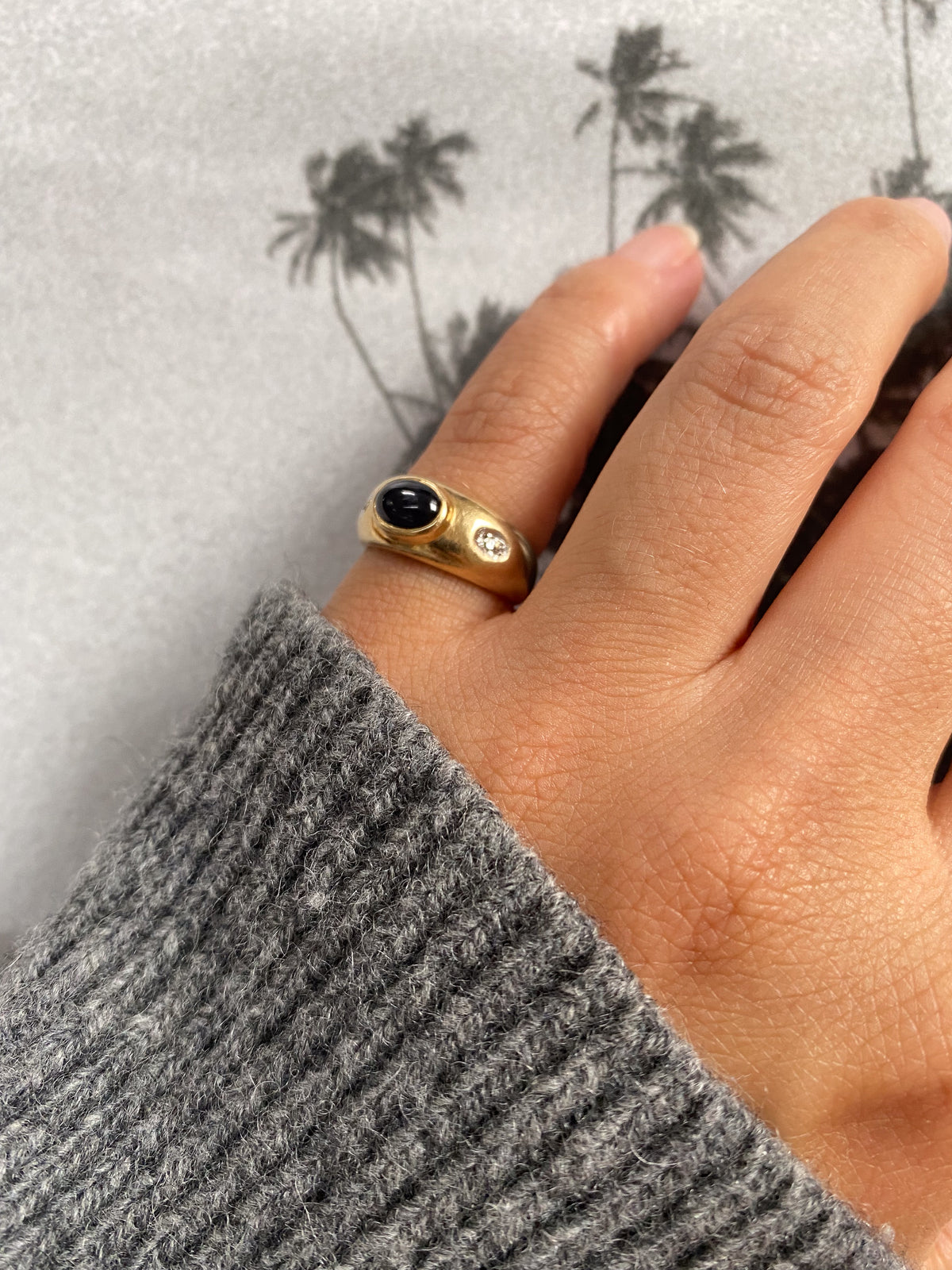 14 carat gold gypsy ring with diamond and oval onyx