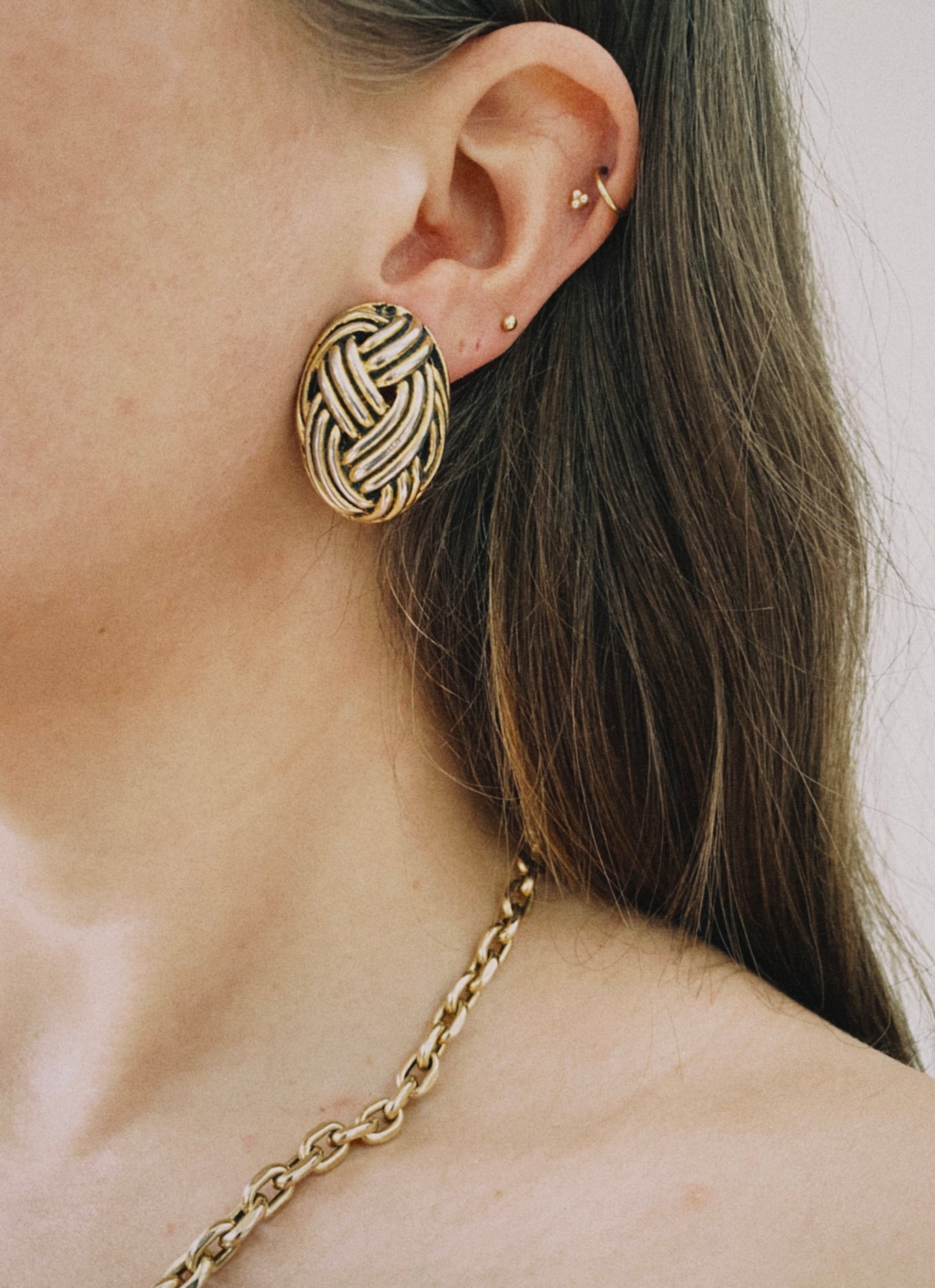 Vintage gold tone braided oval shape clip on earrings