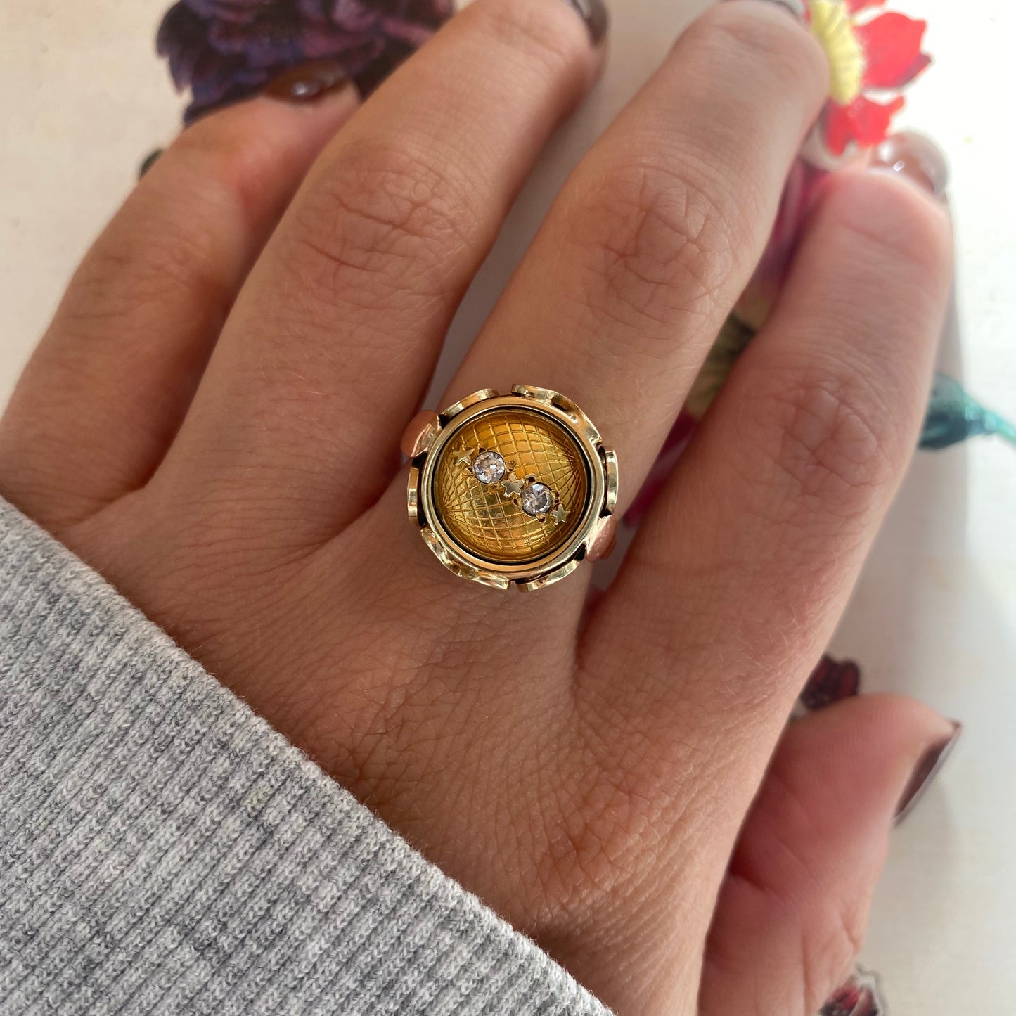 14 carat yellow and rose gold globe coin ring with diamonds