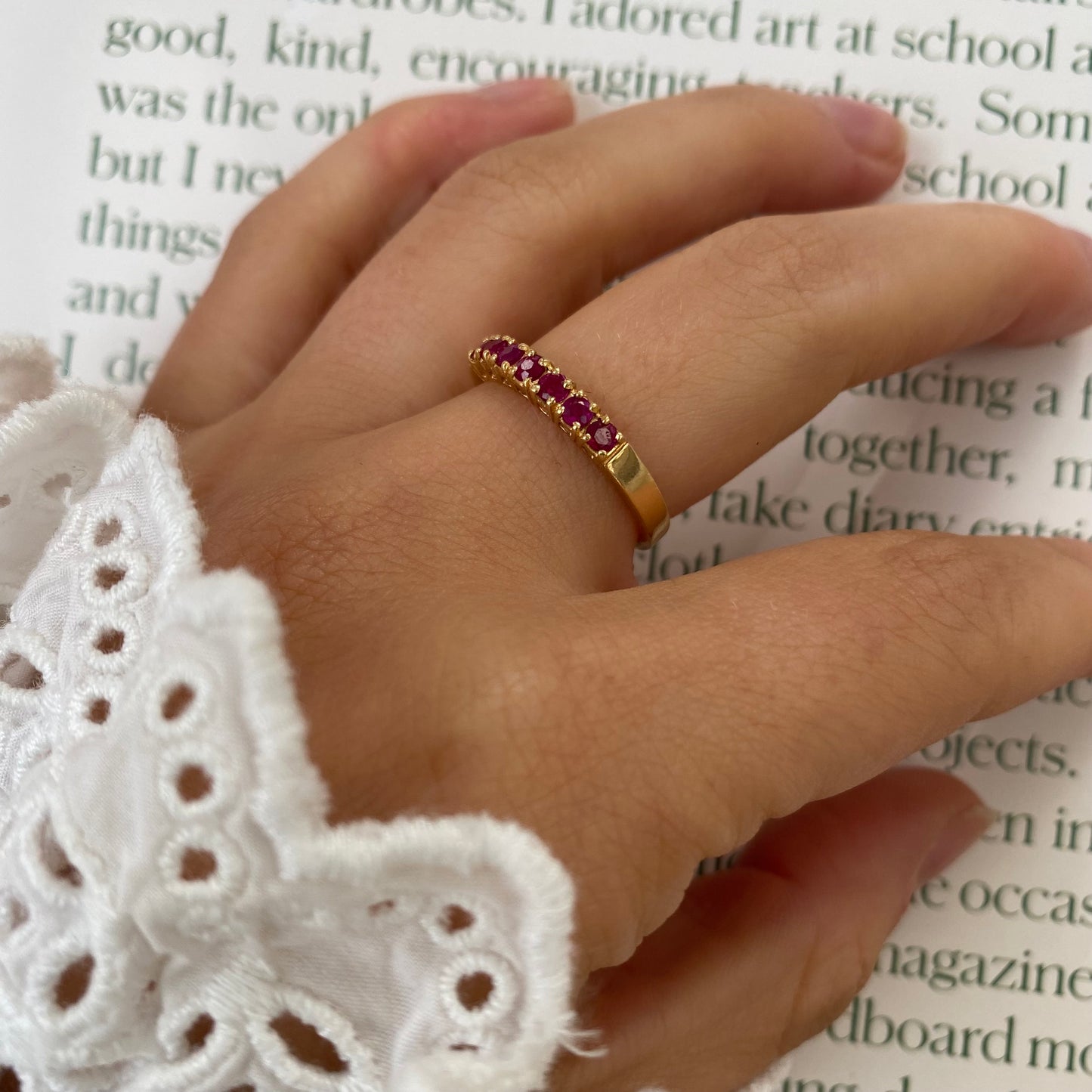 18 carat gold ruby half eternity