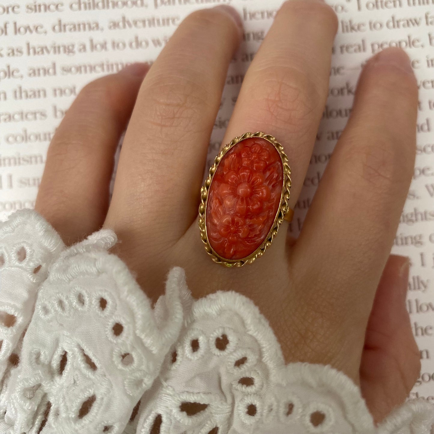 18 carat gold decorative flower coral ring
