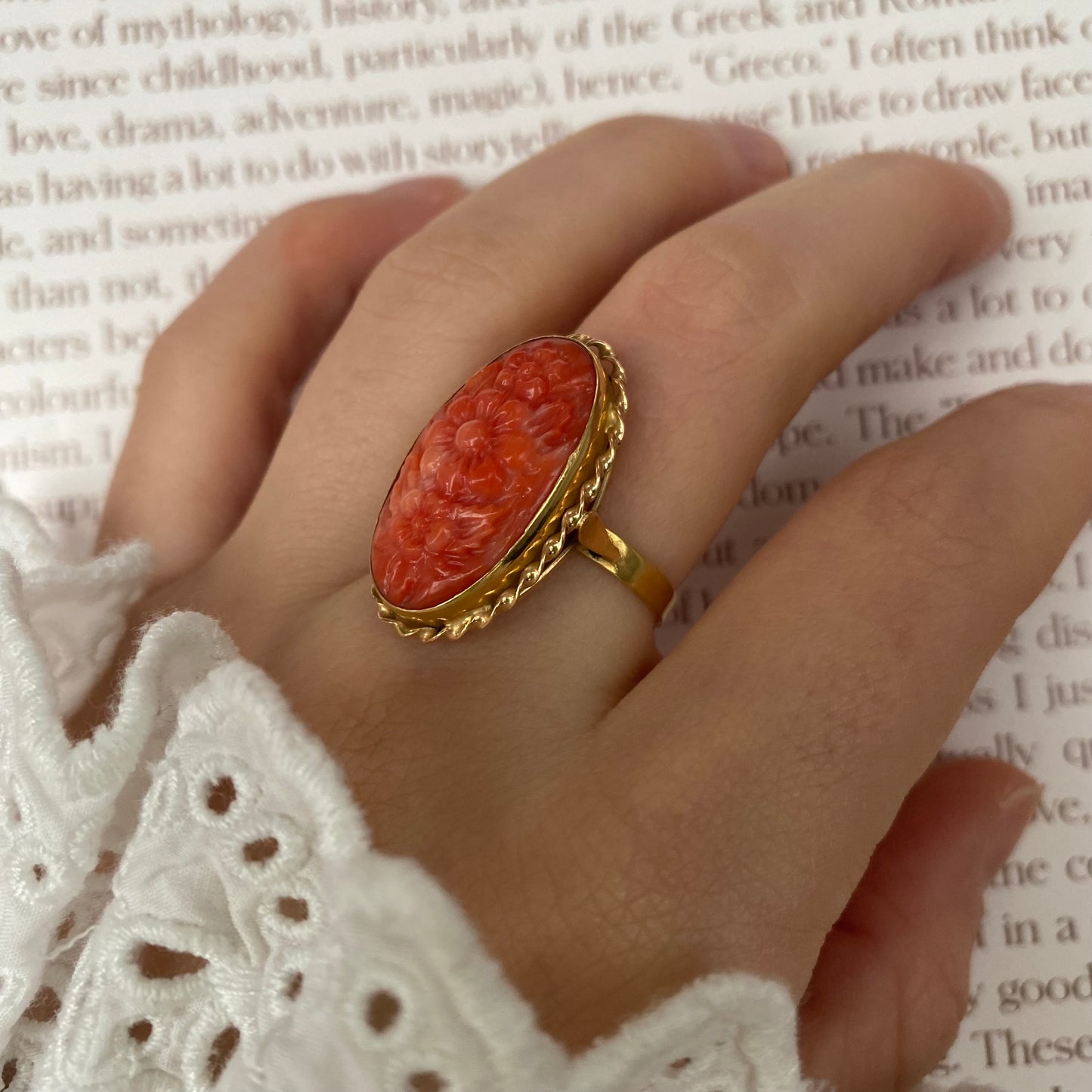 18 carat gold decorative flower coral ring