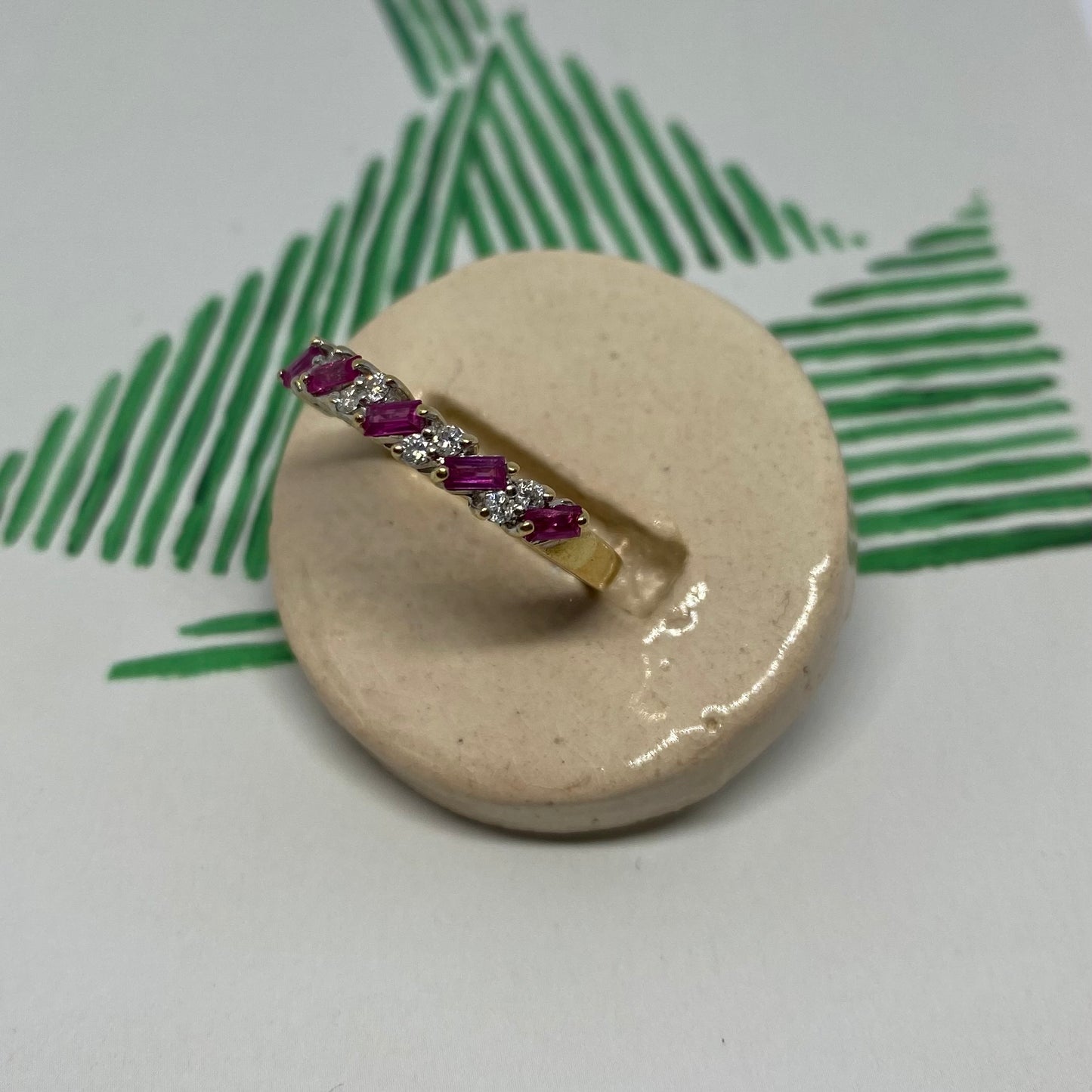 18 carat gold ruby and diamond half eternity ring