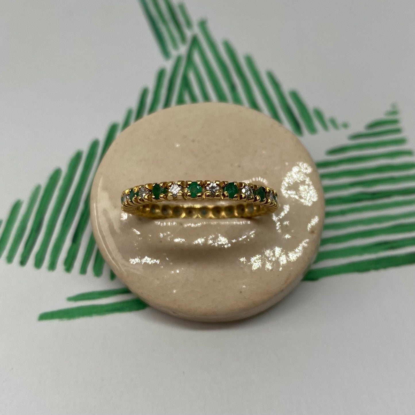 18 carat gold diamond and emerald full eternity