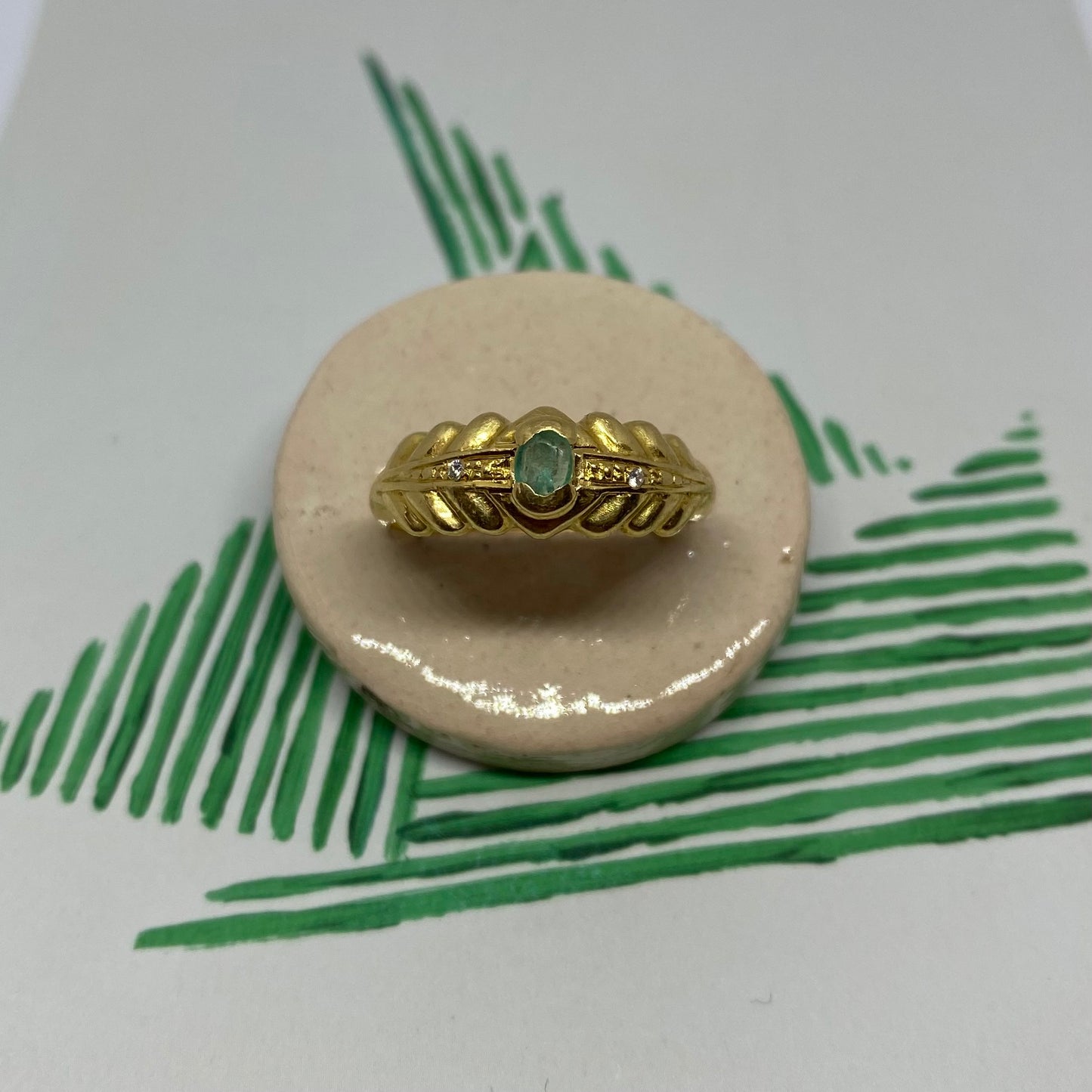 18 carat gold emerald and diamond ring