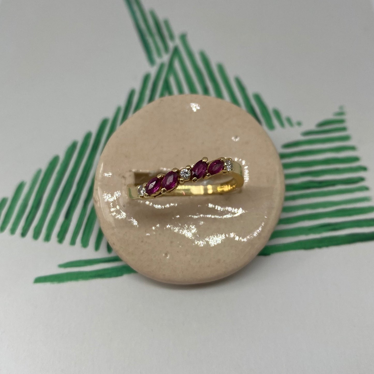 18 carat gold ruby and diamond half eternity