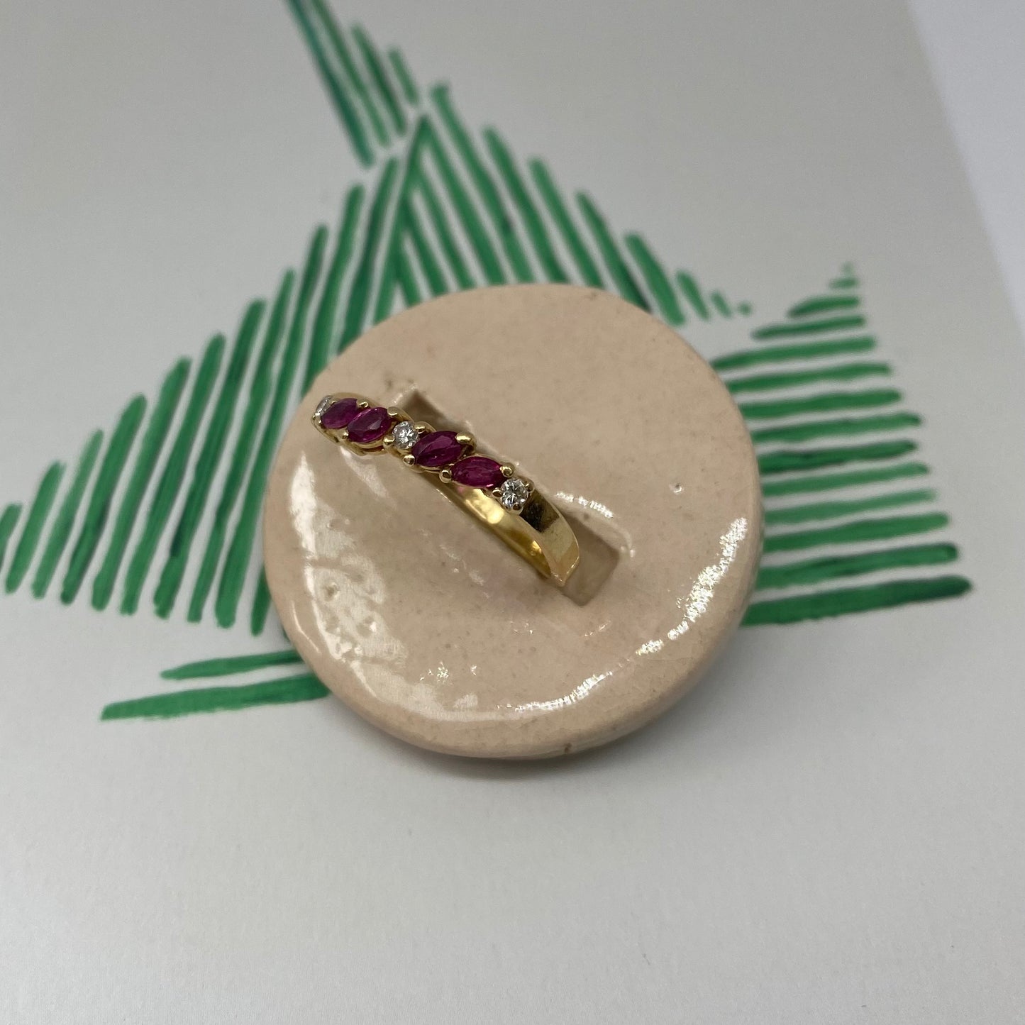 18 carat gold ruby and diamond half eternity