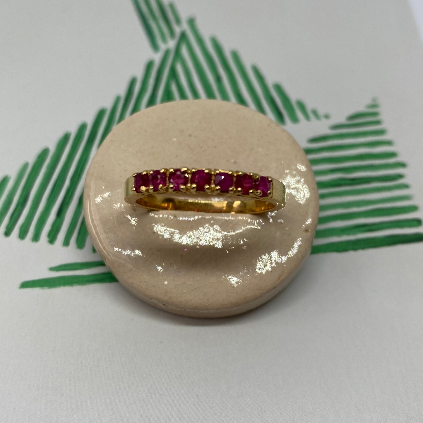 18 carat gold ruby half eternity