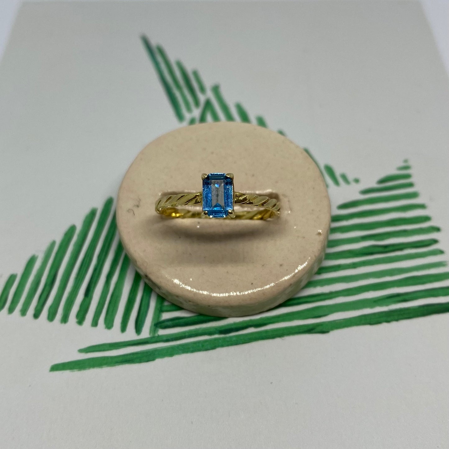 18 carat gold solitaire rectangle aquamarine ring with twisted band