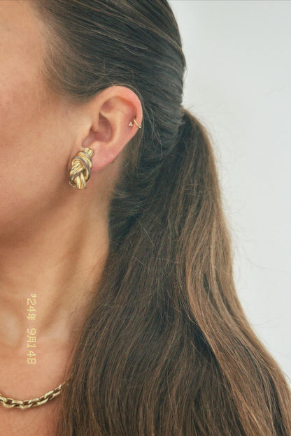 Vintage gold tone small knot clip on earrings