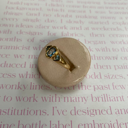 18 carat gold modern trilogy spinel ring