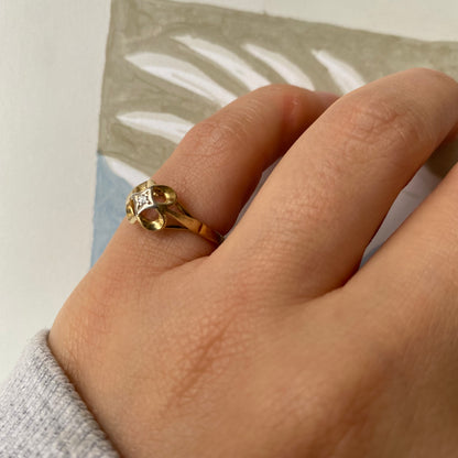 14 carat gold clover ring with diamond in the center