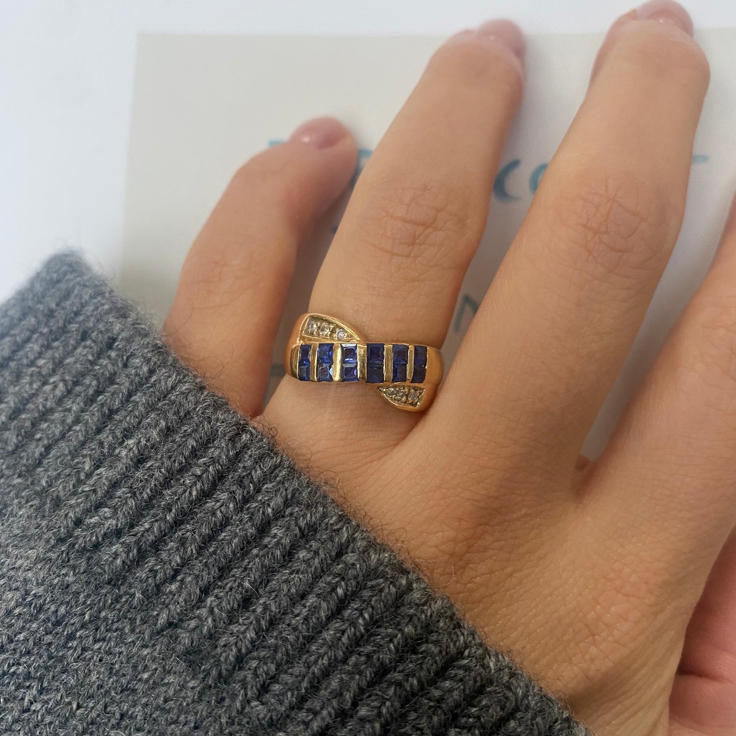14 carat bold twisted sapphire and diamond half eternity ring