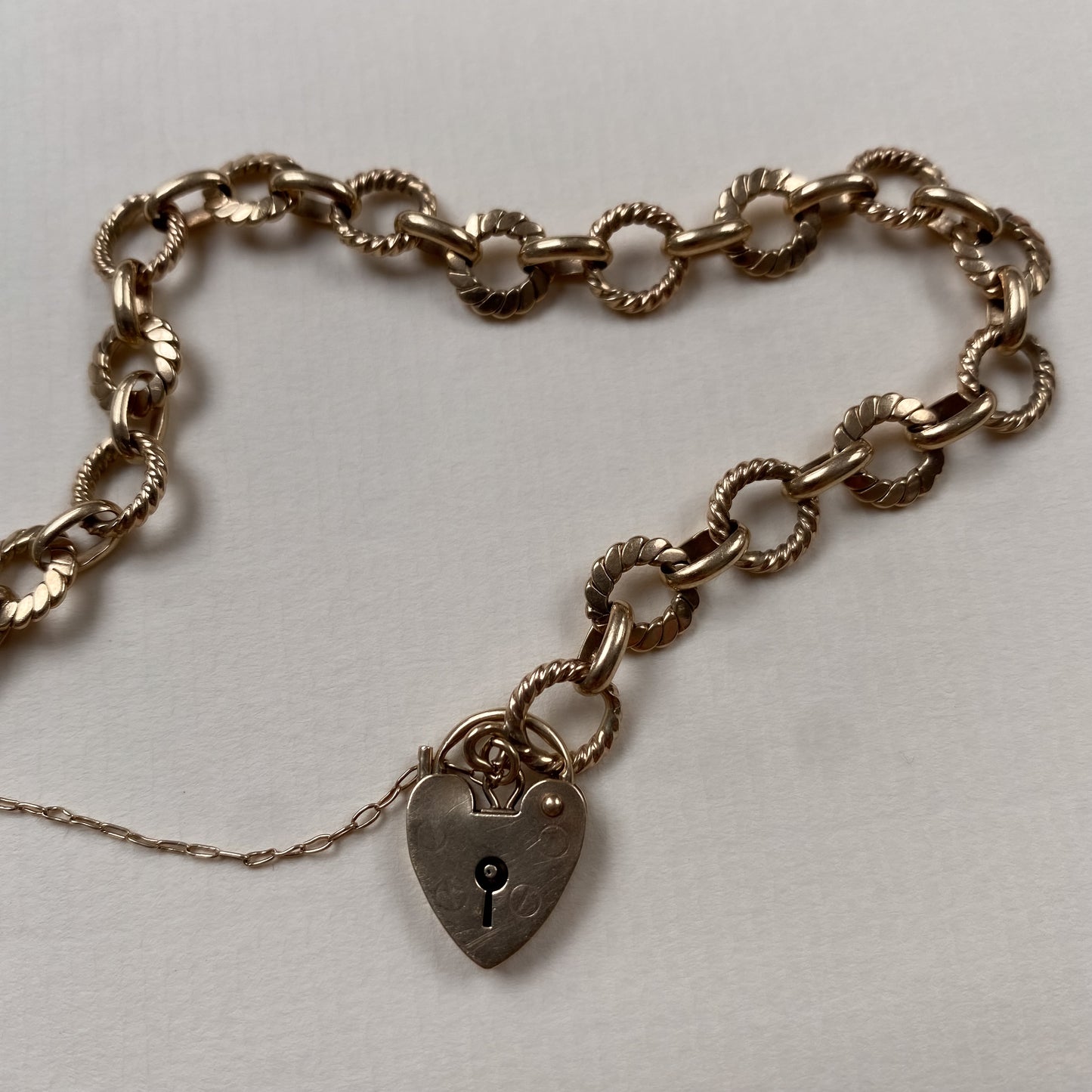 9 carat chain bracelet with padlock heart