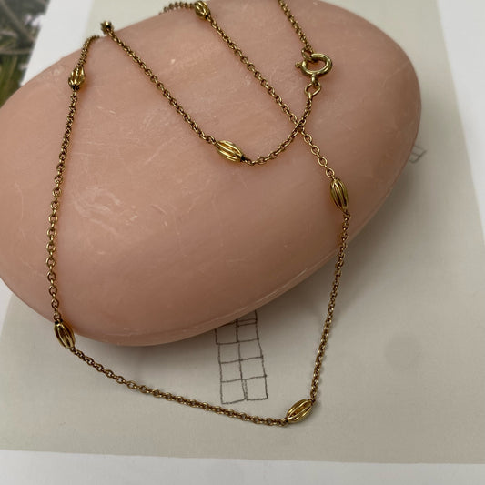 14 carat gold necklace with gold fennel seed beads