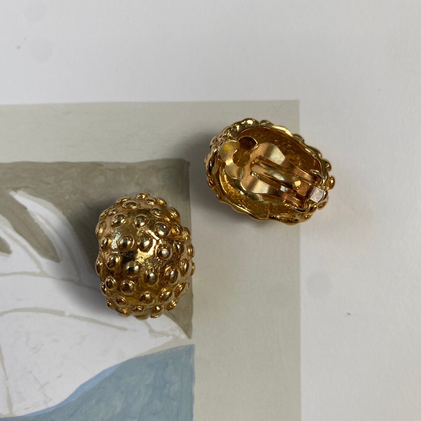 Vintage gold tone dotted clip on earrings