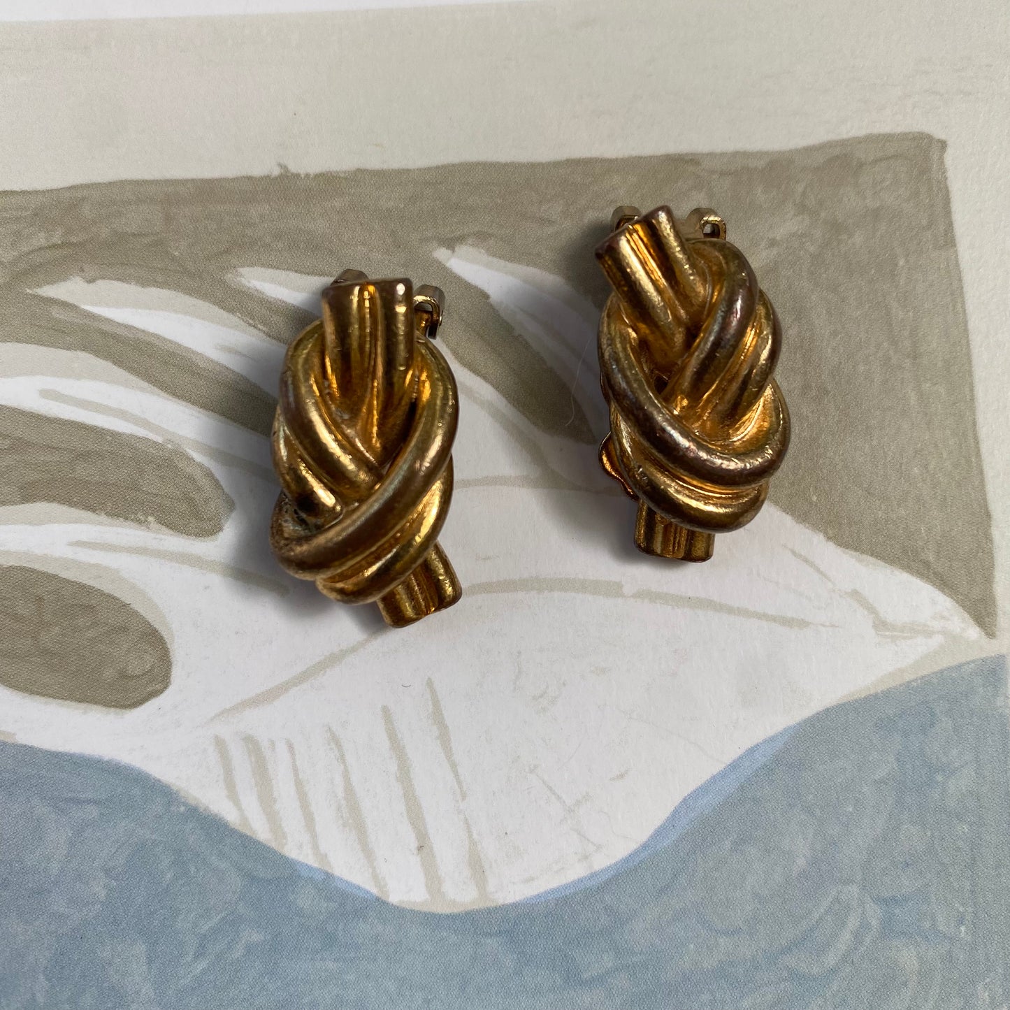 Vintage gold tone small knot clip on earrings
