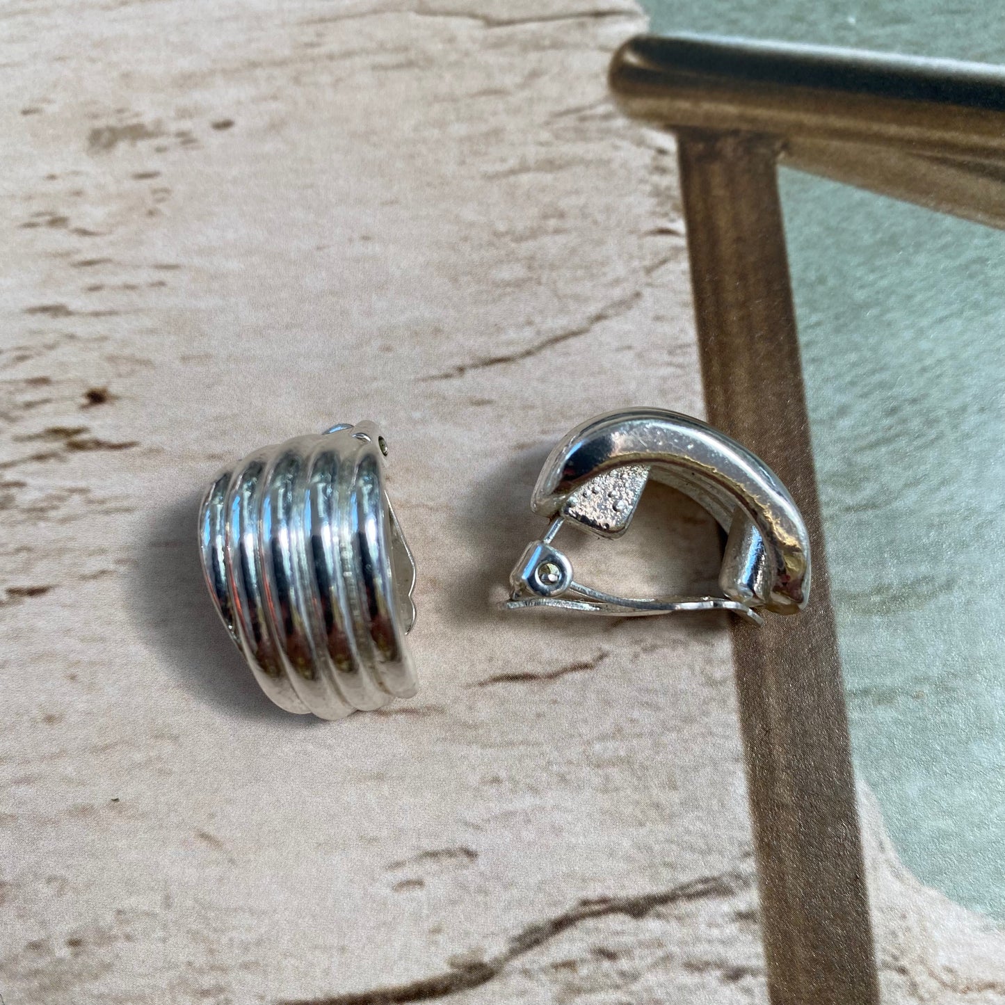 Vintage silver tone striped rounded clip on earrings