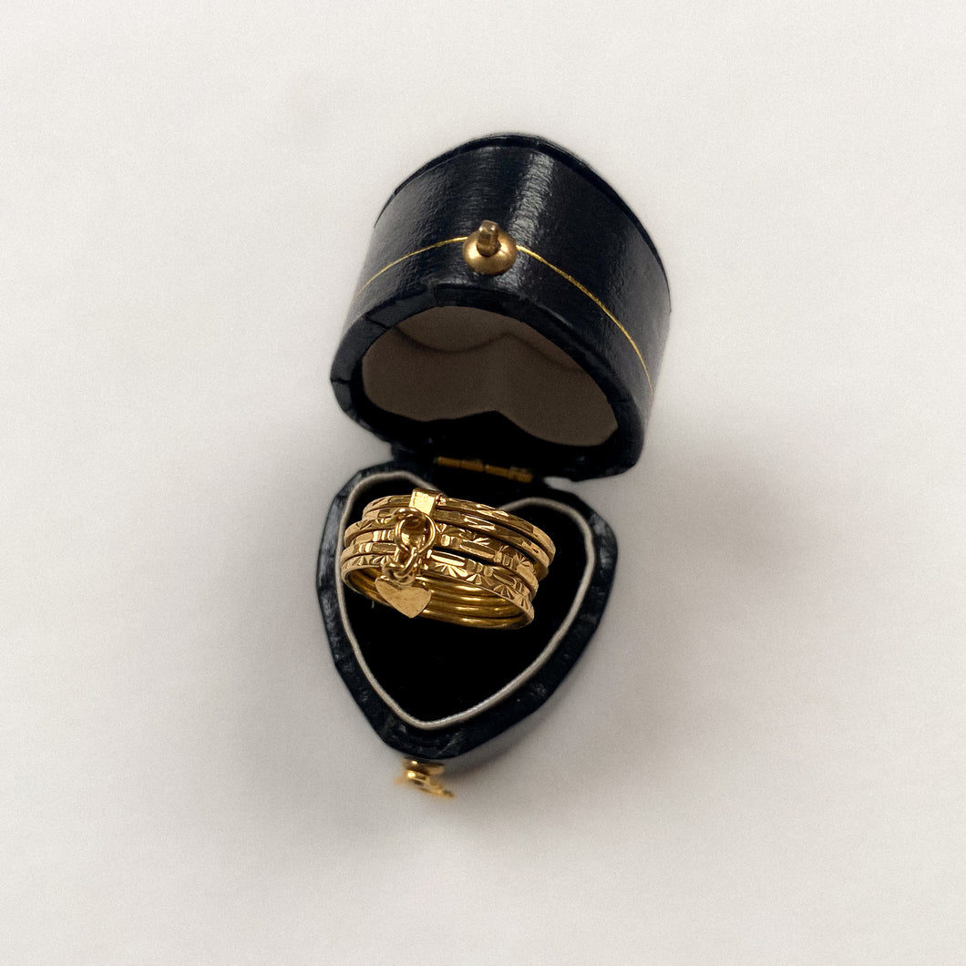 18 carat gold 6 engraved stack ring with heart pendant