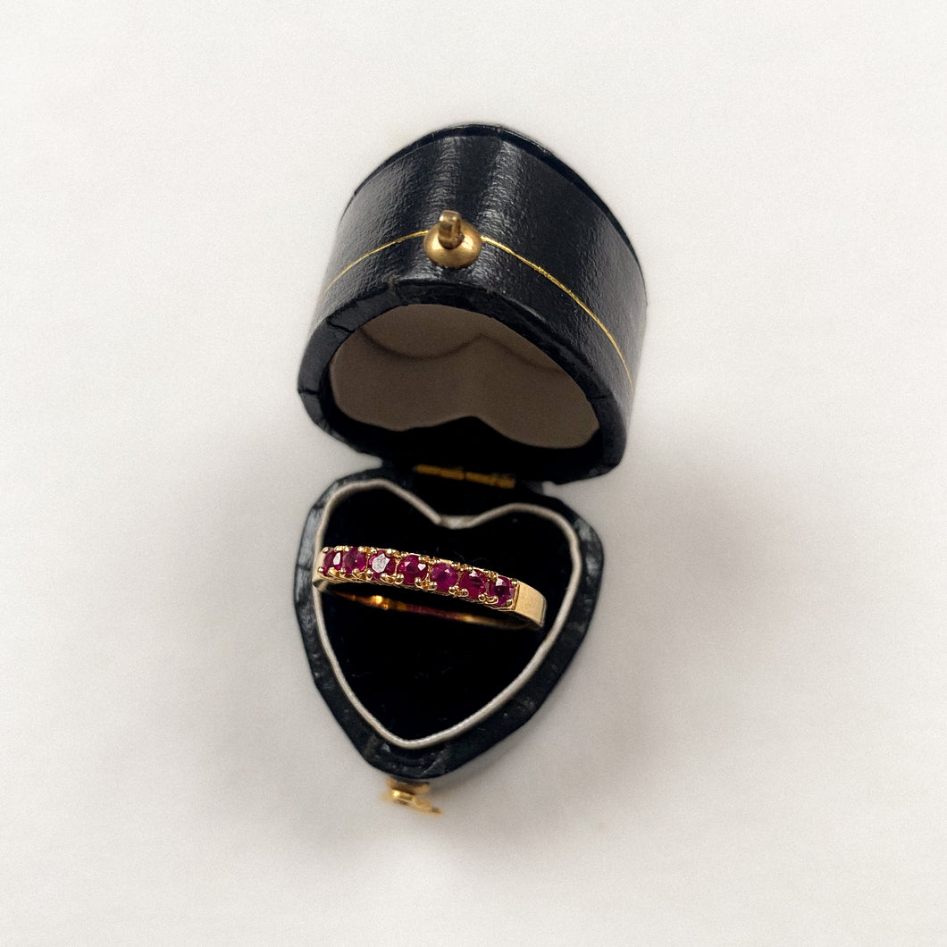 18 carat gold ruby half eternity