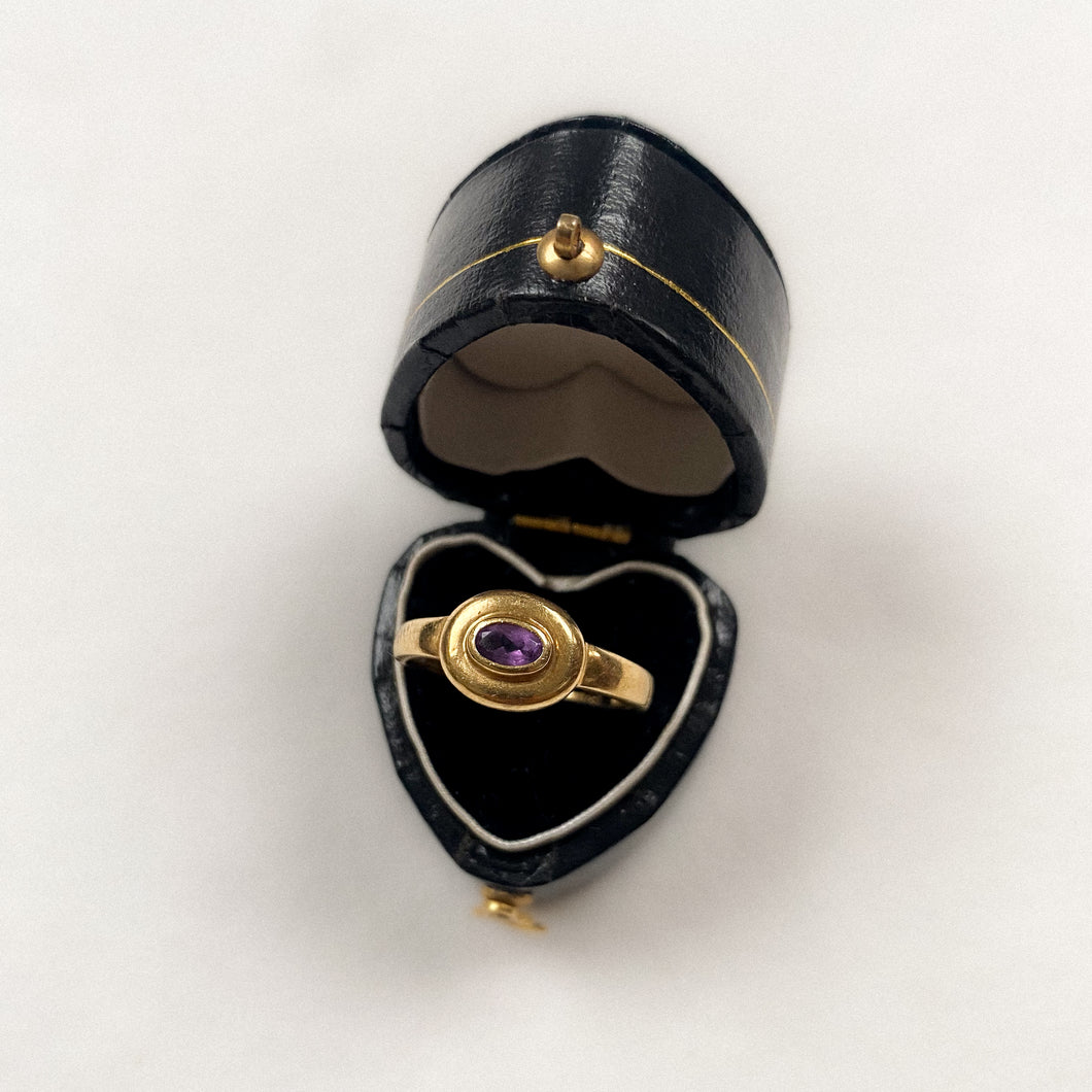 18 carat gold modern oval amethyst ring