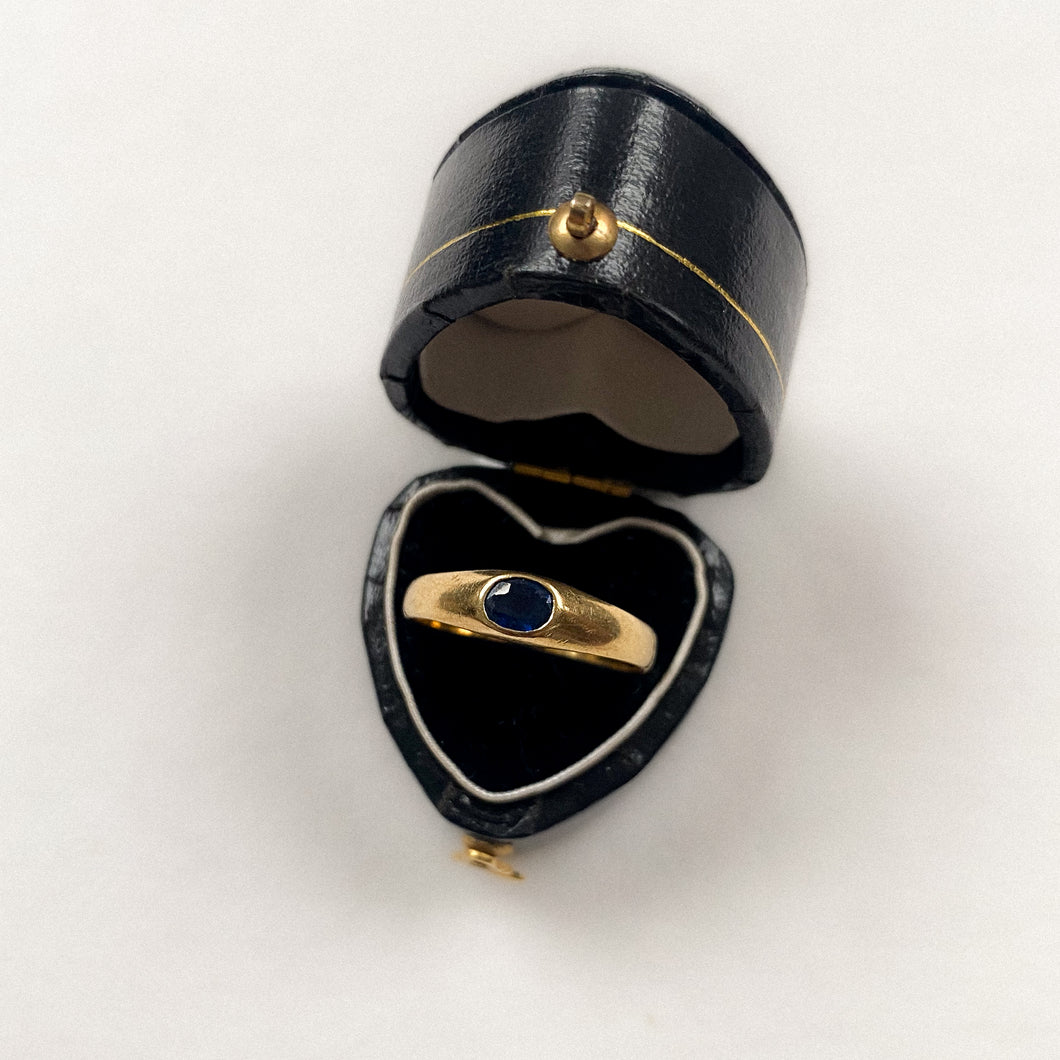 18 carat gold gypsy ring with single oval sapphire